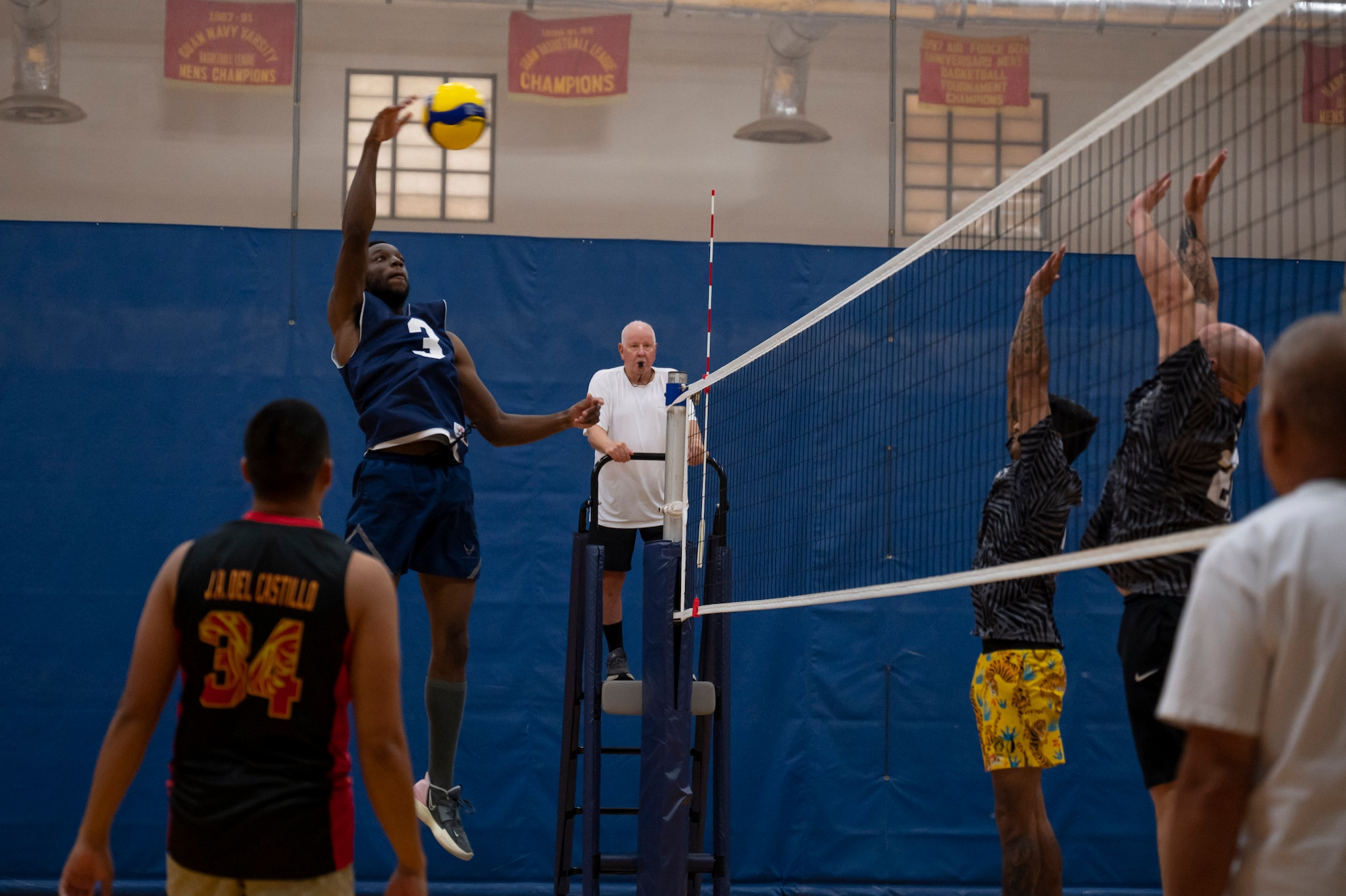 U.S. Air Force Senior Airman Kierhon Wiley, a member of the Civil Engineer Squadron’s intramural volleyball team, hits the ball during the championship game on Andersen Air Force Base, Guam, Oct. 26, 2023. Andersen’s intramural volleyball league ended in a climactic final game between the Security Forces Squadron and CES. The game ended with SFS being named the champions. (U.S. Air Force photo by Airman 1st Class Spencer Perkins)