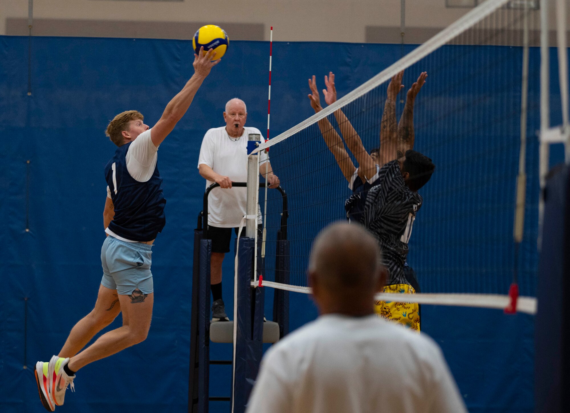 Staff Sgt. Joshua Bohling, a member of the Civil Engineer Squadron’s intramural volleyball team, hits the ball during the championship game on Andersen Air Force Base, Guam, Oct. 26, 2023. Andersen’s intramural volleyball league ended in a climactic final game between the Security Forces Squadron and CES. The game ended with SFS being named the champions. (U.S. Air Force photo by Airman 1st Class Spencer Perkins)
