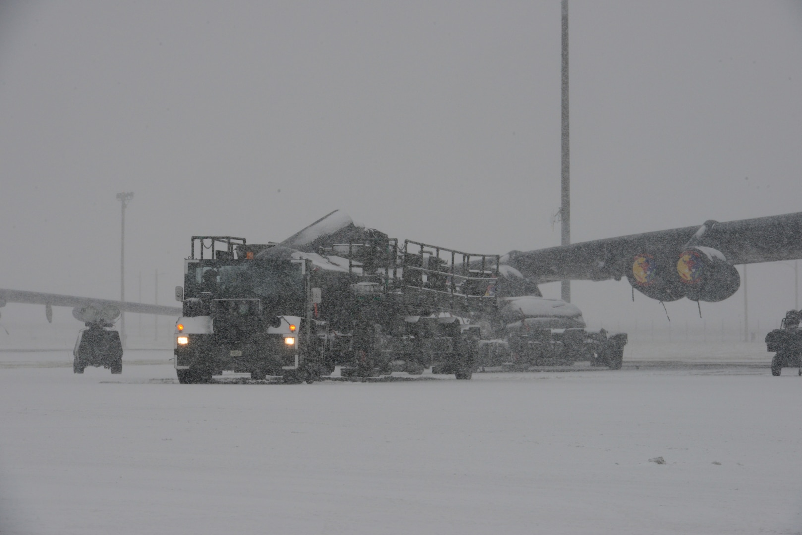 Airmen from the 705th Munitions Squadron transport AGM-86B ALCMs during Exercise Prairie Vigilance 24-1 at Minot Air Force Base, North Dakota, Oct. 23, 2023. Prairie Vigilance was conducted with a focus on the safe and secure handling of assets and capabilities that comprise the nuclear triad. (U.S. Air Force photo by Airman 1st Class Trust Tate)