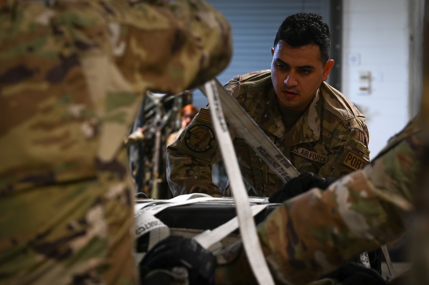 airmen building pallet