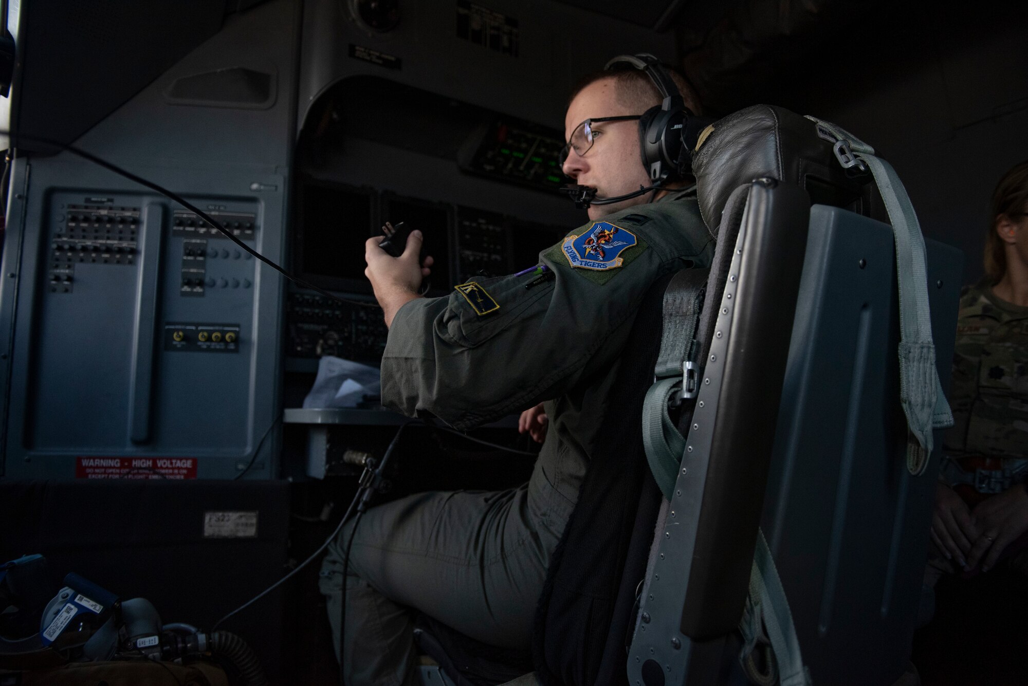 U.S. Air Force Captain David Saunders, 71st Rescue Squadron combat systems officer, operates CSO equipment on an HC-130J Combat King II above Moody Air Force Base, Georgia, Oct. 26, 2023. A CSO provides U.S. Air Force aircraft with a variety of offensive and defensive capabilities to project force and maintain the safety of the aircraft and aircrew. (U.S. Air Force photo by Staff Sgt. Thomas Johns)