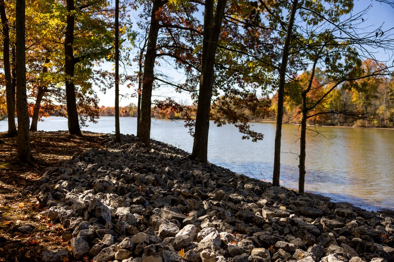 A maintenance mechanic completes a shoreline stabilization project work using a backhoe at Shenango River Lake in Hermitage, Pennsylvania, Oct. 24, 2023.