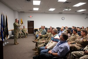 A man speaks to a crowd.