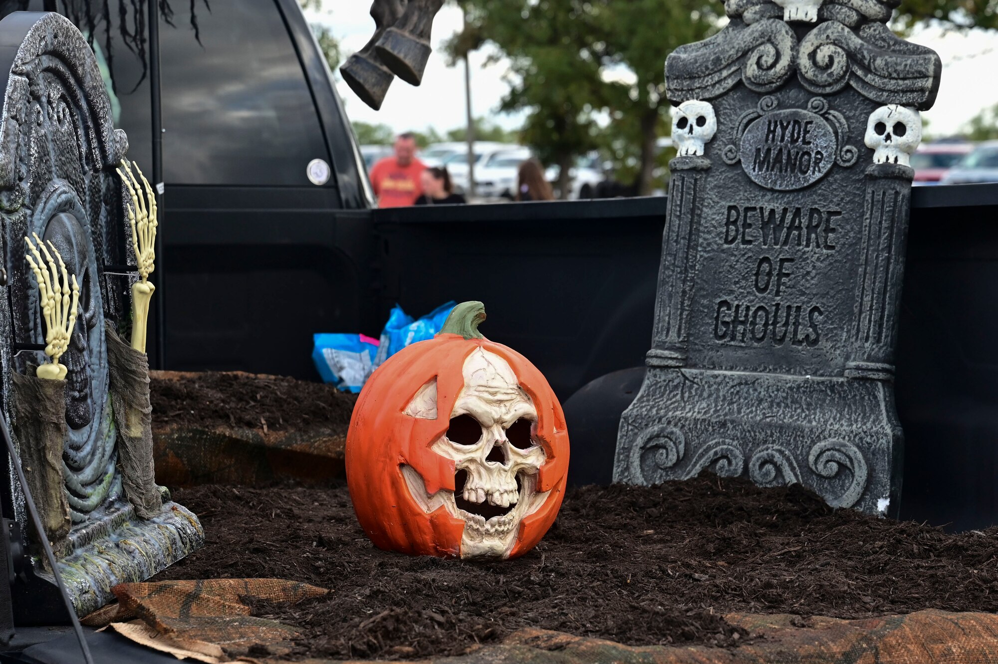 Decorations are displayed during the Ghoulfellow Trunk or Treat event hosted at the Louis F. Garland Fire Academy, Goodfellow Air Force Base, Texas, Oct. 28, 2023. Volunteers filled 35 parking spots at the Fire Academy, where they decorated their trunks and passed out treats to nearly 2,000 costumed attendees. (U.S. Air Force photo by Airman 1st Class Madison Collier)