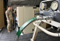 Soldiers with the 6th Medical Logistics Management Center inspect the new Expeditionary Deployable Oxygen Concentration System, or EDOCS, during a training event in late September at Fort Detrick, Maryland. (C.J. Lovelace)