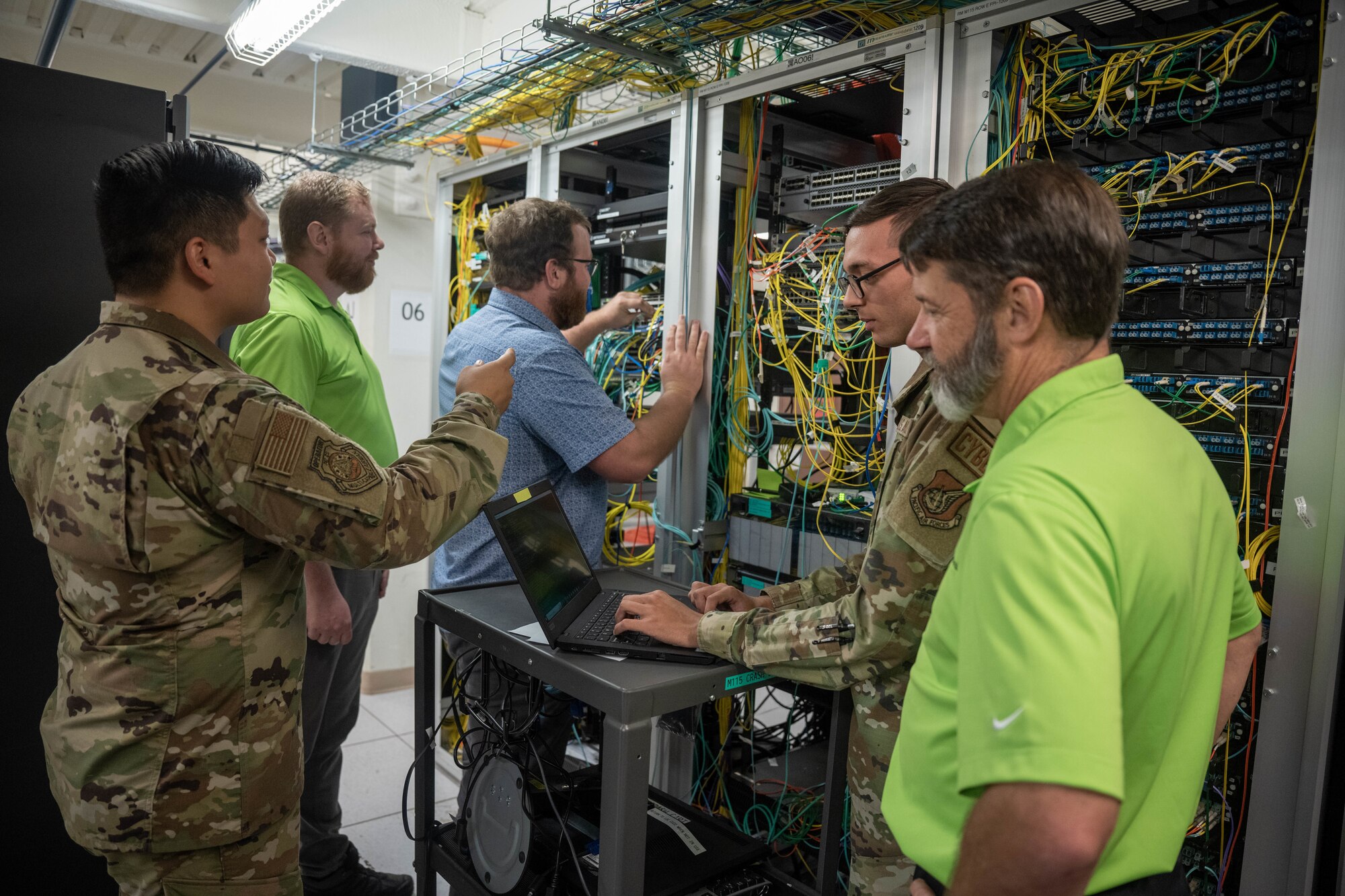 Airmen assigned to the 747th Cyberspace Squadron and industry partners upgrade the core network infrastructure on Joint Base Pearl Harbor-Hickam, Hawaii, Oct. 10, 2023. The project was executed by 11 Airmen and three contractors during a 28 hour authorized service interruption period and increased network stability support of Hickam Air Field. (U.S. Air Force photo by Senior Airman Makensie Cooper)