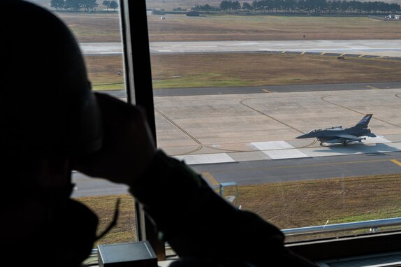 8th Operations Support Squadron air traffic control watch supervisor, observes the take-off of an F-16 Fighting Falcon during Vigilant Defense 24 at Kunsan Air Base