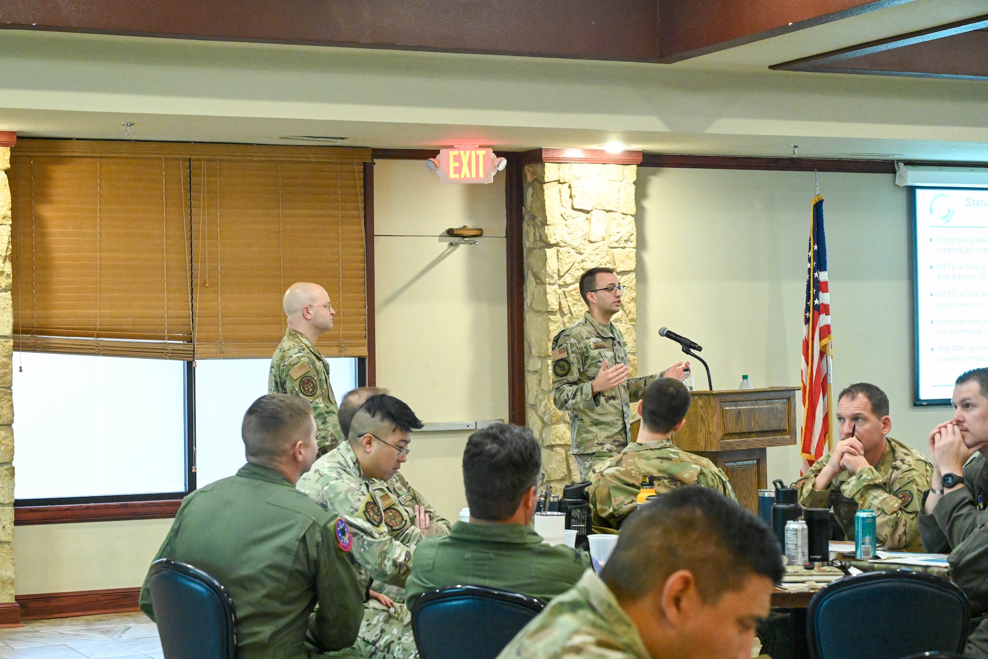 U.S. Air Force Maj. Christopher Mitchell, Headquarters Air Force chief of joint service policy and legislation, speaks during a military justice symposium at Altus Air Force Base, Oklahoma, Oct. 23, 2023. The discussion was centered around an executive order made earlier this year regarding the Office of Special Trial Counsel. (U.S. Air Force photo by Senior Airman Miyah Gray)