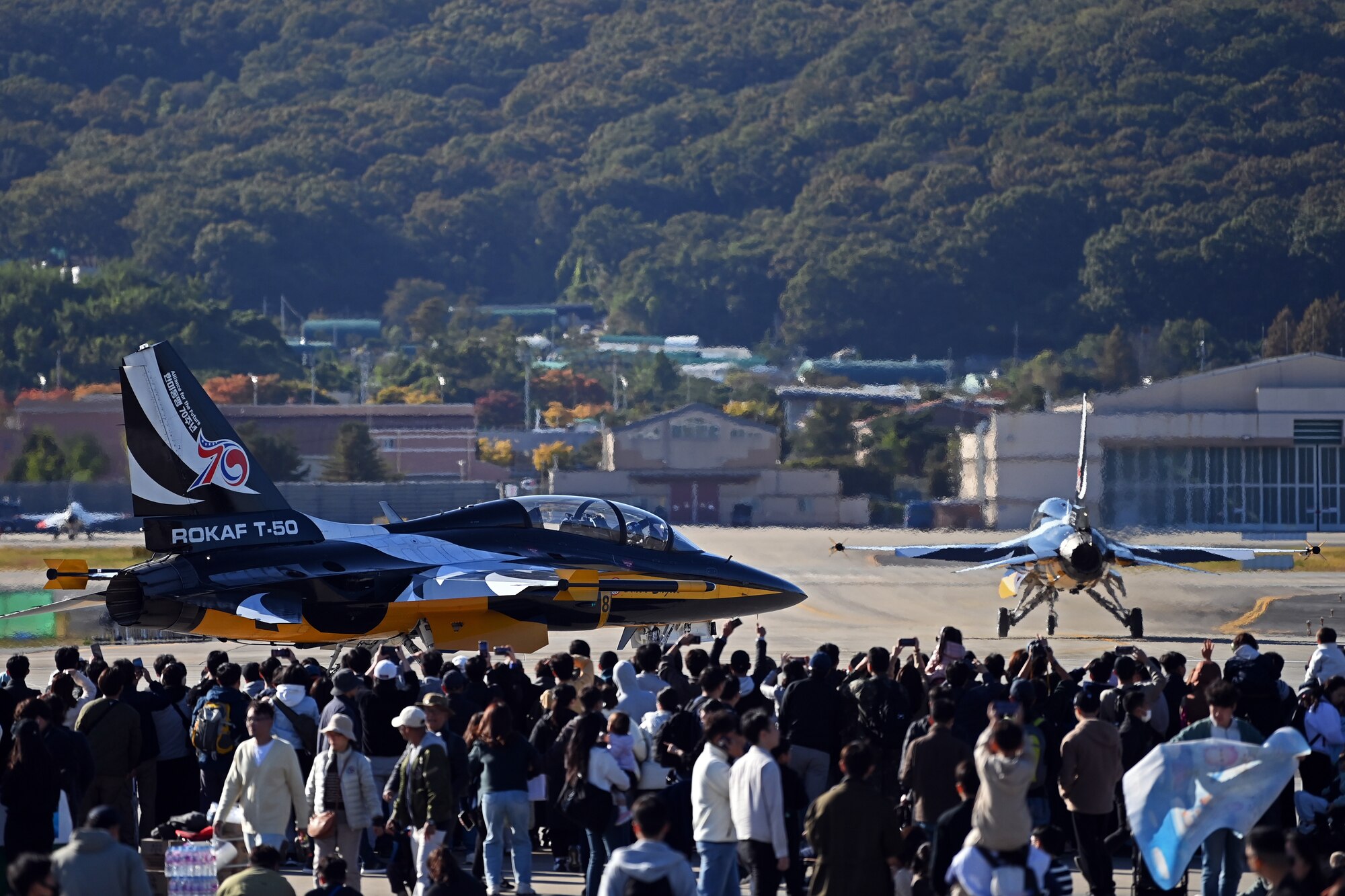 The Republic of Korea Air Force 53rd Air Demonstration Group, nicknamed the Black Eagles, taxi to the runway prior to an aerial demonstration during the 2023 Seoul International Aerospace and Defense Exhibition at Seoul Air Base, Republic of Korea, Oct. 21, 2023.