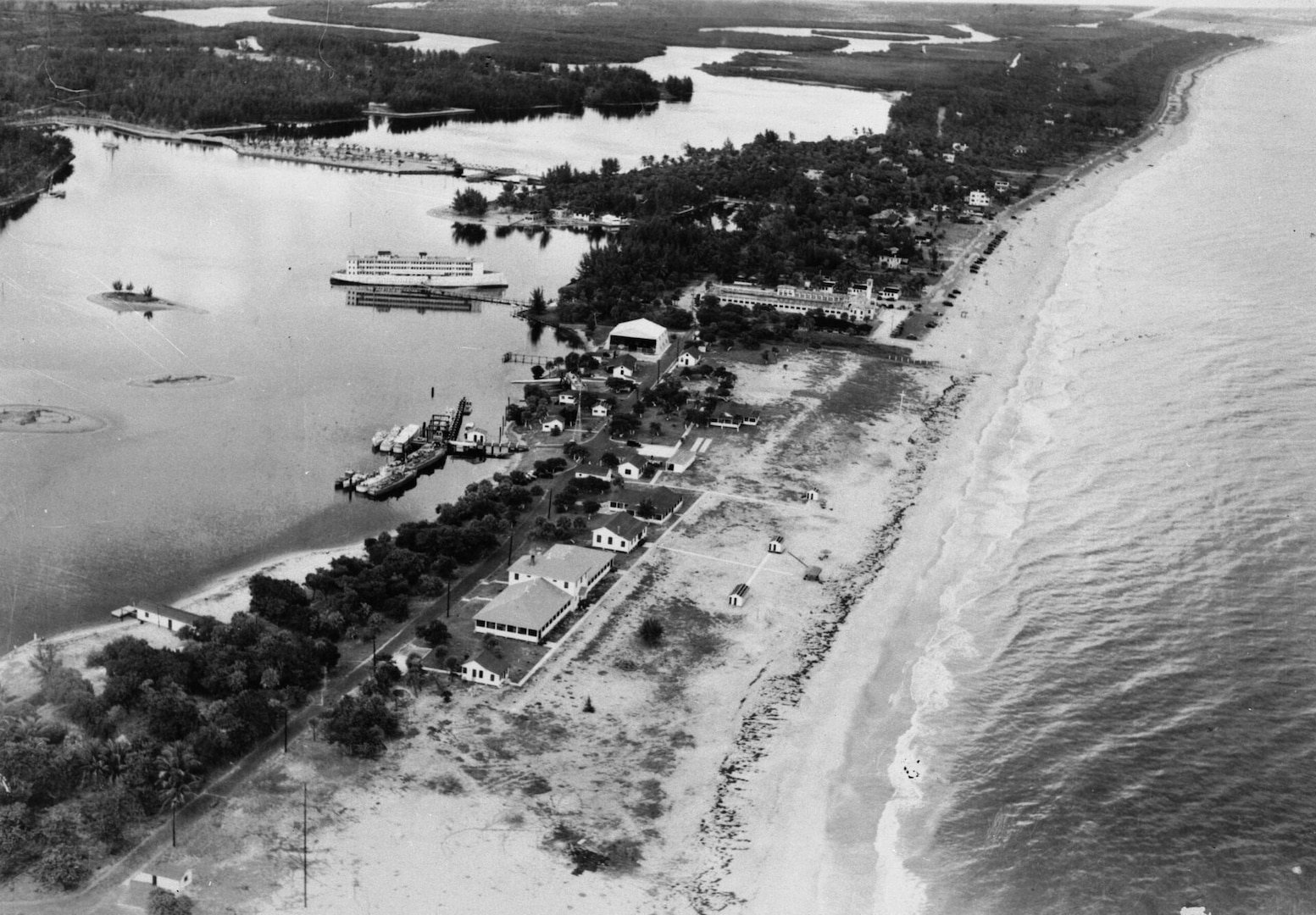 Aerial view of Coast Guard Base Six during its Prohibition enforcement days, showing its small aviation hangar and rafted patrol boats. (Courtesy of the Fort Lauderdale Historical Society)