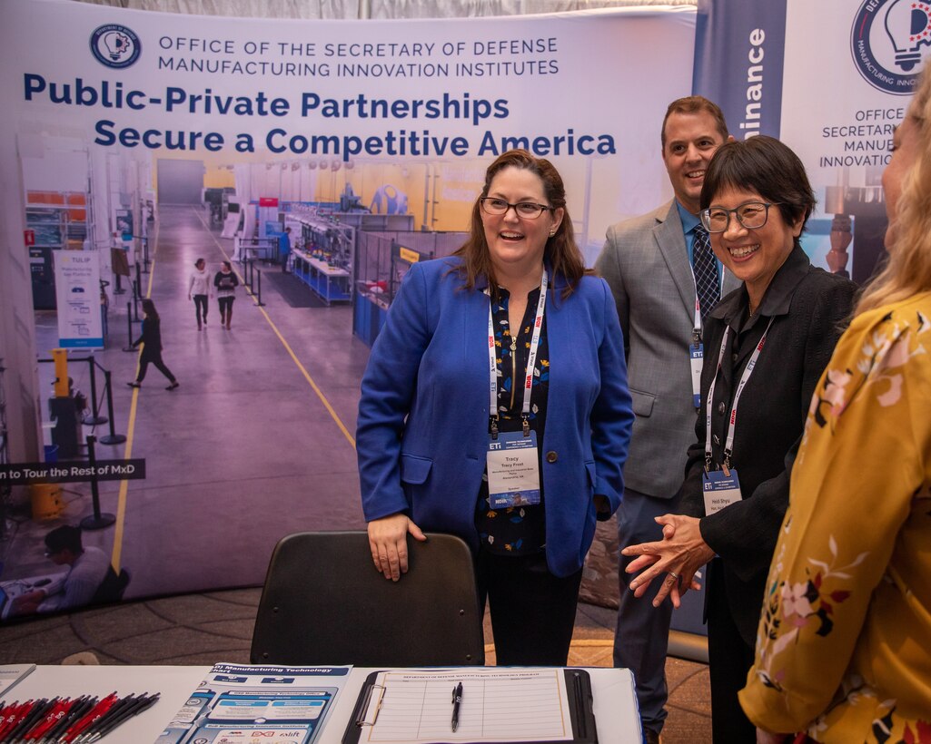 WASHINGTON (August 29, 2023) - Defense Undersecretary for Research and Engineering Heidi Shyu right, and Dod Manufacturing Technology Program Director, Tracy Frost, interact with conference participants at the Emerging Technologies for Defense Conference and Exhibition, August 29, 2023.