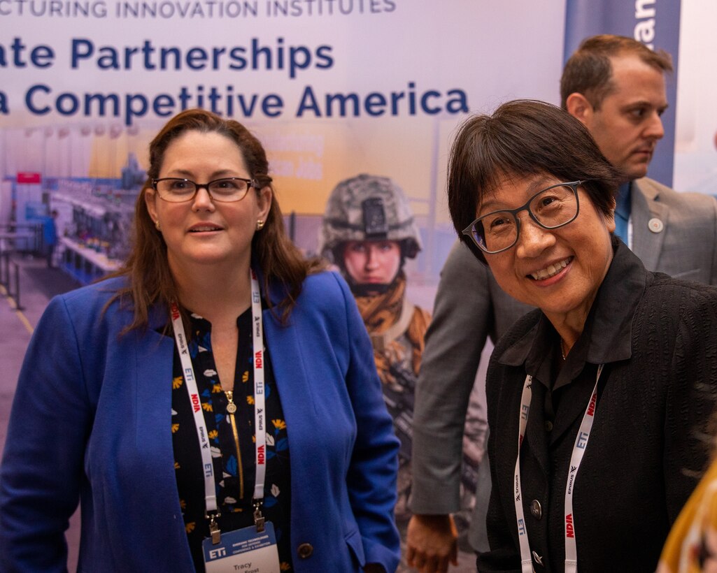 WASHINGTON (August 29, 2023) - Defense Undersecretary for Research and Engineering Heidi Shyu right, and Dod Manufacturing Technology Program Director, Tracy Frost, interact with conference participants at the Emerging Technologies for Defense Conference and Exhibition, August 29, 2023.