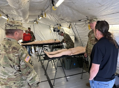 Reserve Soldiers with the 1171st Medical Company Area Support prepare for a capabilities experiment for U.S. Army Futures Command’s new Prolonged Care Augmentation Detachment, or PCAD, during Operation Northern Strike, Aug. 12-15, at Camp Grayling, Michigan. (U.S. Army photo courtesy Keith Griffith)