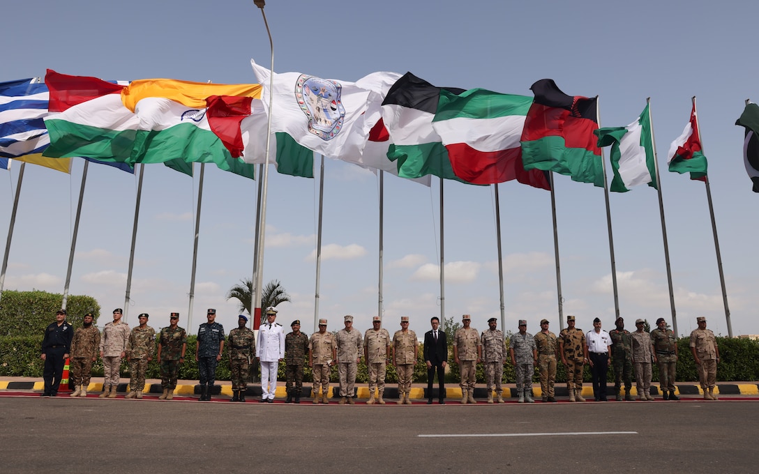 Partner nation military leaders stand together during the Bright Star 23 opening ceremony at Mohamed Naguib Military Base (MNMB), Egypt, Aug. 31, 2023. Bright Star 23 is a multilateral U.S. Central Command exercise held with the Arab Republic of Egypt across air, land, and sea domains that promotes and enhances regional security and cooperation and improves interoperability in irregular warfare against hybrid threat scenarios. (U.S. Marine Corps photo by Sgt. Angela Wilcox)