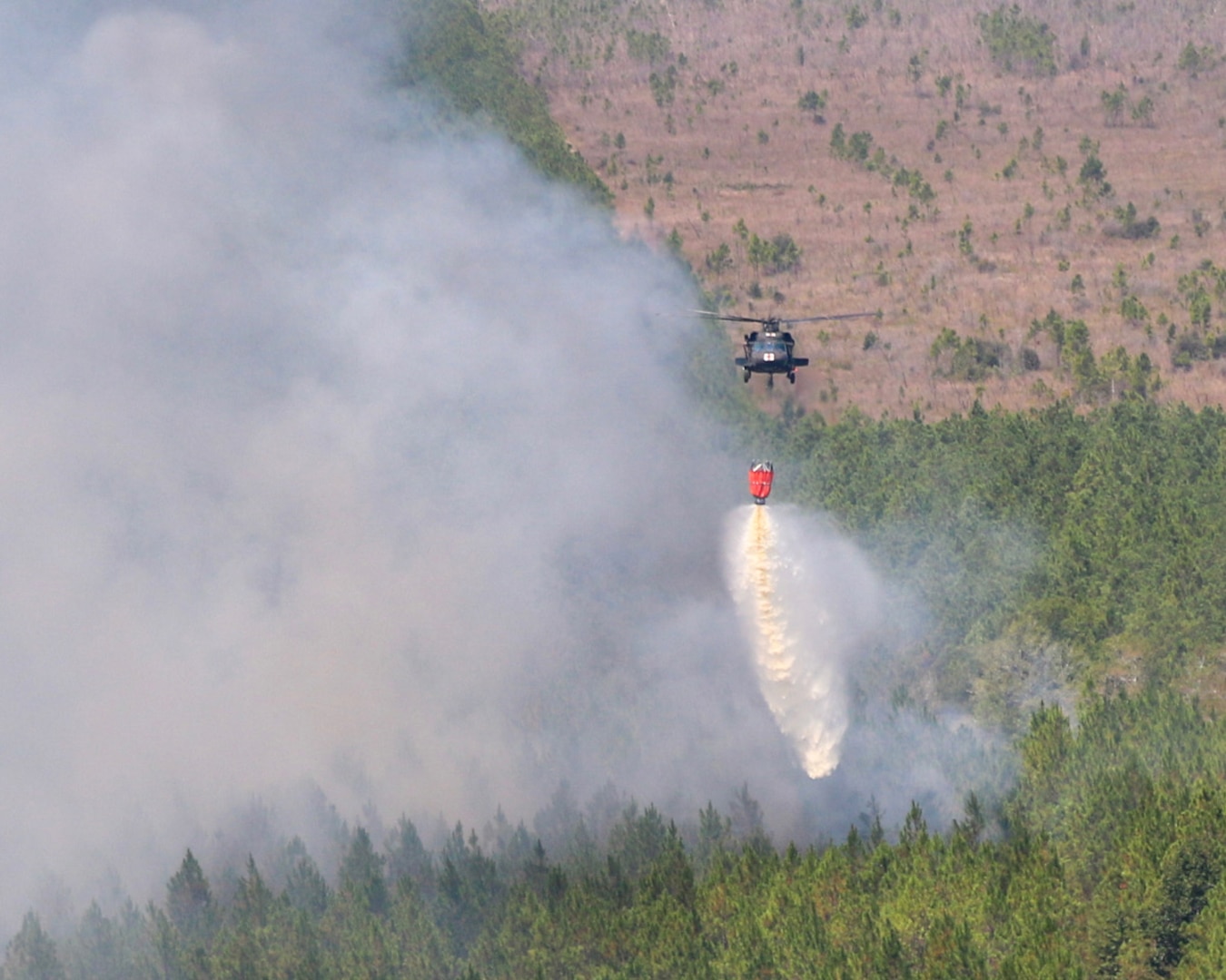 Helicopter crews from the Louisiana, Arkansas, Tennessee, Oklahoma and Alabama National Guard have dropped more than 1.1 million gallons of water on wildfires in western Louisiana since Aug. 23, 2023.