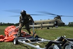 Louisiana National Guard aviation assets began water-drop missions Aug. 23, 2023, to combat wildfires in western Louisiana. They have been assisted by the Oklahoma, Alabama, Arkansas and Tennessee National Guard.