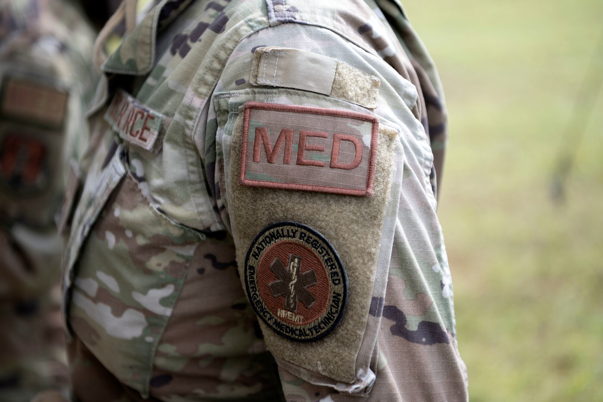 Detailed photo of the Medical occupational patch worn by U.S. Airmen assigned to the 156th Medical Group, Detachment 1, during a collective training exercise at Camp Santiago Joint Training Center, Salinas, Puerto Rico, Aug. 10, 2023. The exercise allowed service members assigned to the 156th Medical Group, 123rd Medical Group and the Puerto Rico Army National Guard to exchange knowledge and implement the National Guard CBRN Response Enterprise Information Management System, which assists with accelerating data collection from search and extraction teams in emergency events. (U.S. Air National Guard photo by Master Sgt. Rafael D. Rosa)