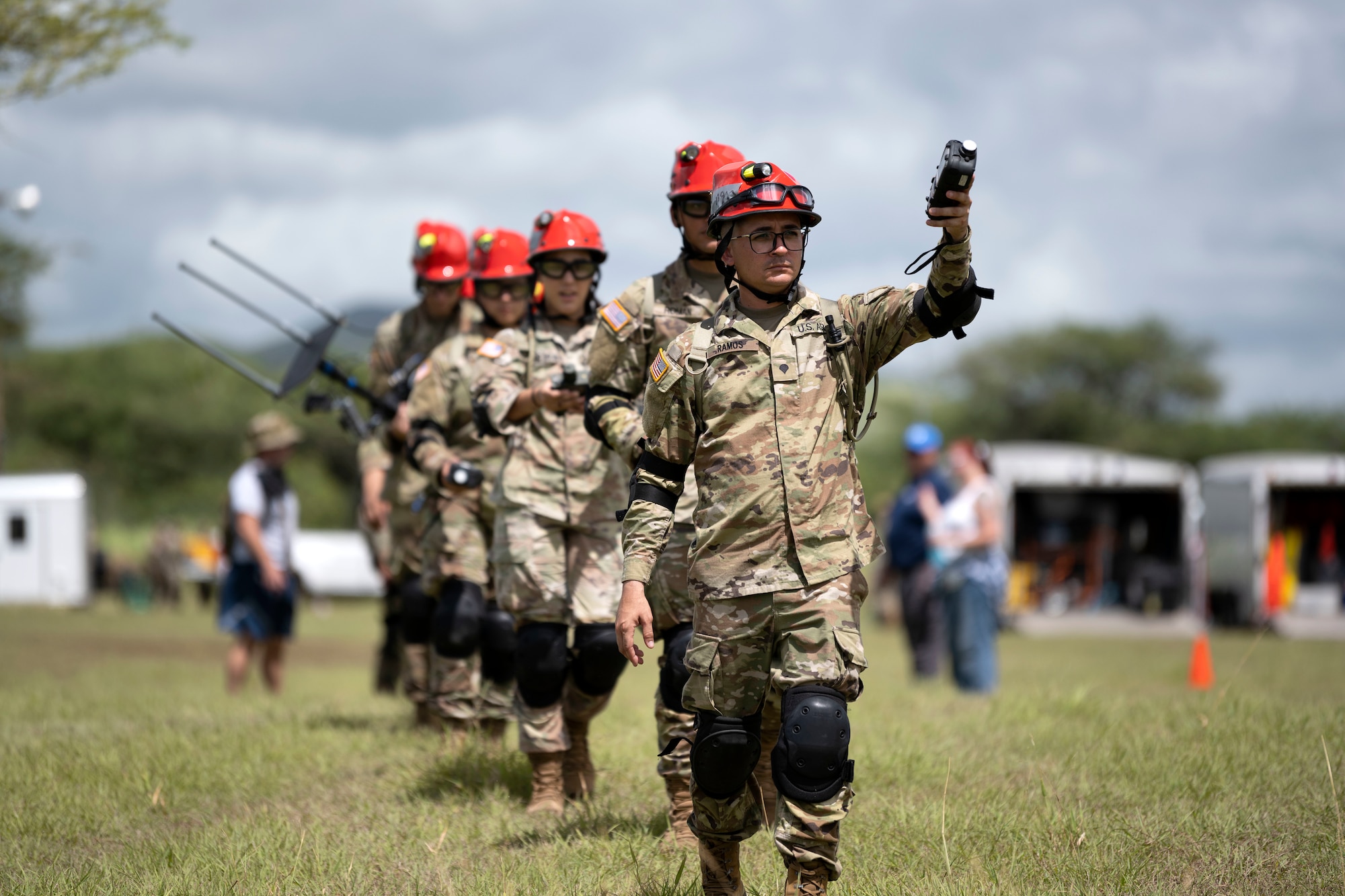 U.S. Soldiers assigned to the Puerto Rico Army National Guard conduct search and rescue operations during a collective training exercise at Camp Santiago Joint Training Center, Salinas, Puerto Rico, Aug. 10, 2023. The exercise allowed service members assigned to the 156th Medical Group, 123rd Medical Group and the Puerto Rico Army National Guard to exchange knowledge and implement the National Guard CBRN Response Enterprise Information Management System, which assists with accelerating data collection from search and extraction teams in emergency events. (U.S. Air National Guard photo by Master Sgt. Rafael D. Rosa)