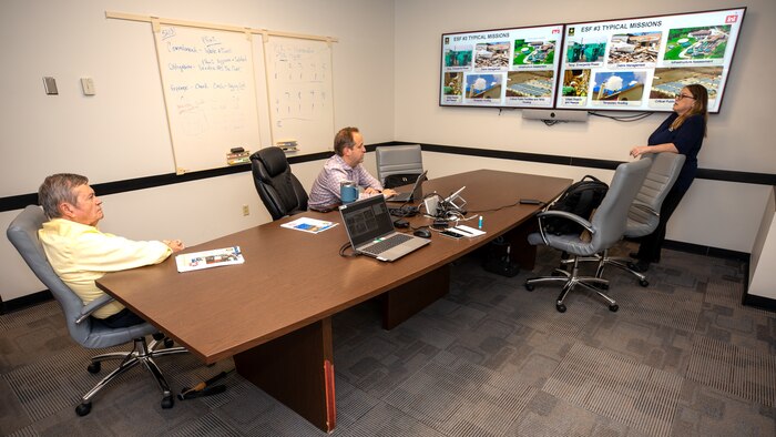 Donna Williams, USACE, New Orleans District (MVN), Internal Review (IR) chief, right, Albert Hervey, Galveston District (SWG) IR chief, left and Geoffrey Veuleman, SWG IR auditor, center, meet in the Jadwin Building, Aug. 31, 2023. Williams visited Galveston to train with SWG IR auditors.