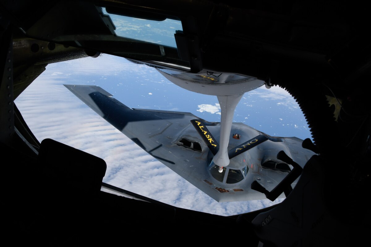 A U.S. Air Force B-2 Spirit Stealth Bomber from Whiteman Air Force Base, Mo., approaches a KC-135 Stratotanker from the 168th Wing, Alaska Air National Guard, during a Red Flag Alaska-23 aerial refueling mission over Alaska, Aug. 15, 2023.
