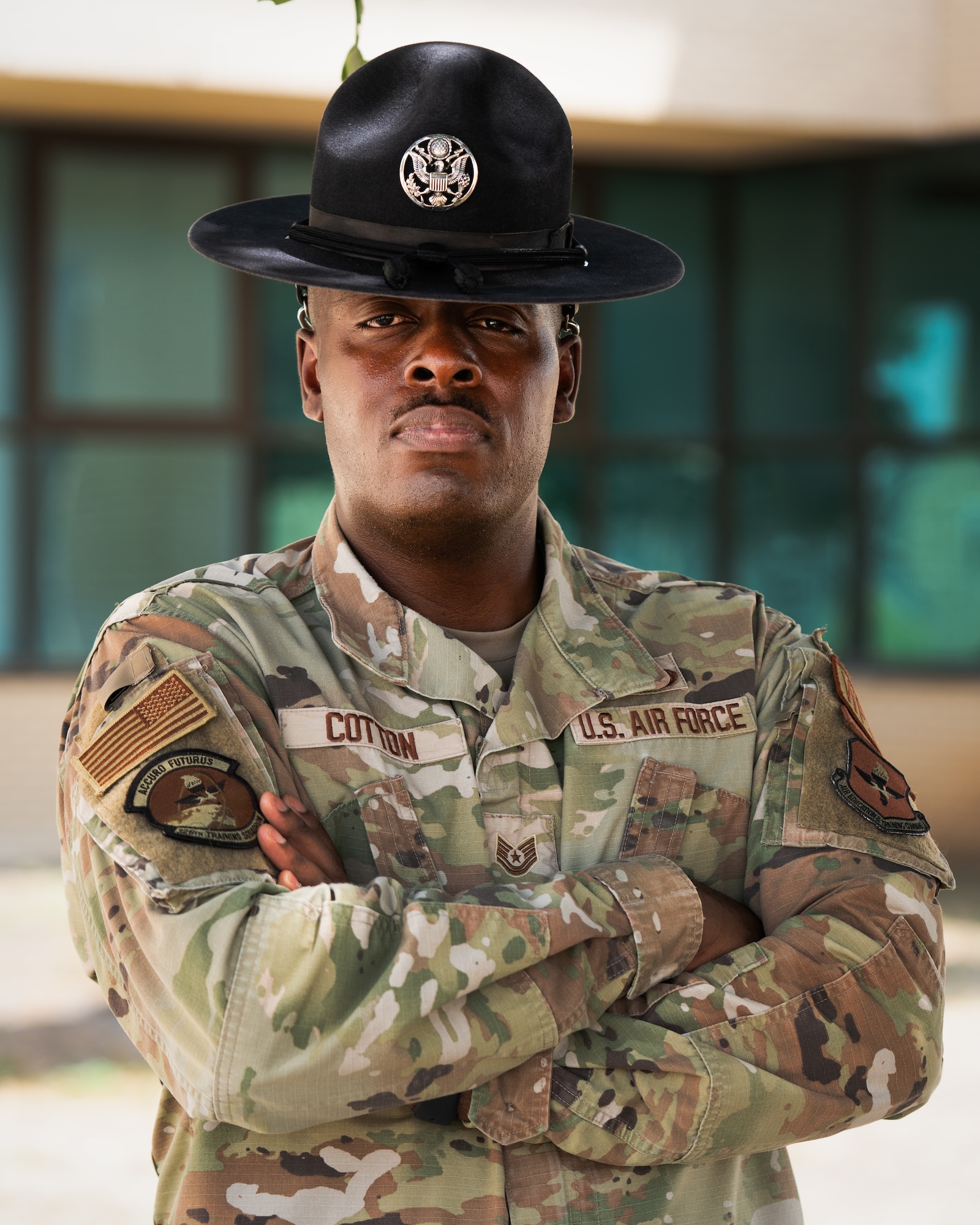 Tech. Sgt. Nigel Cotton, 326th Training Squadron military training instructor trainer, poses for a photo, Aug. 31, 2023, at Joint Base San Antonio-Lackland, Texas. In the resilience issue of Airman Magazine, Cotton shared the challenges he faced while acclimating to the new environment and the experience he had seeking mental health services from the military consult service. (U.S. Air Force photo by Master Sgt. Christopher Griffin)