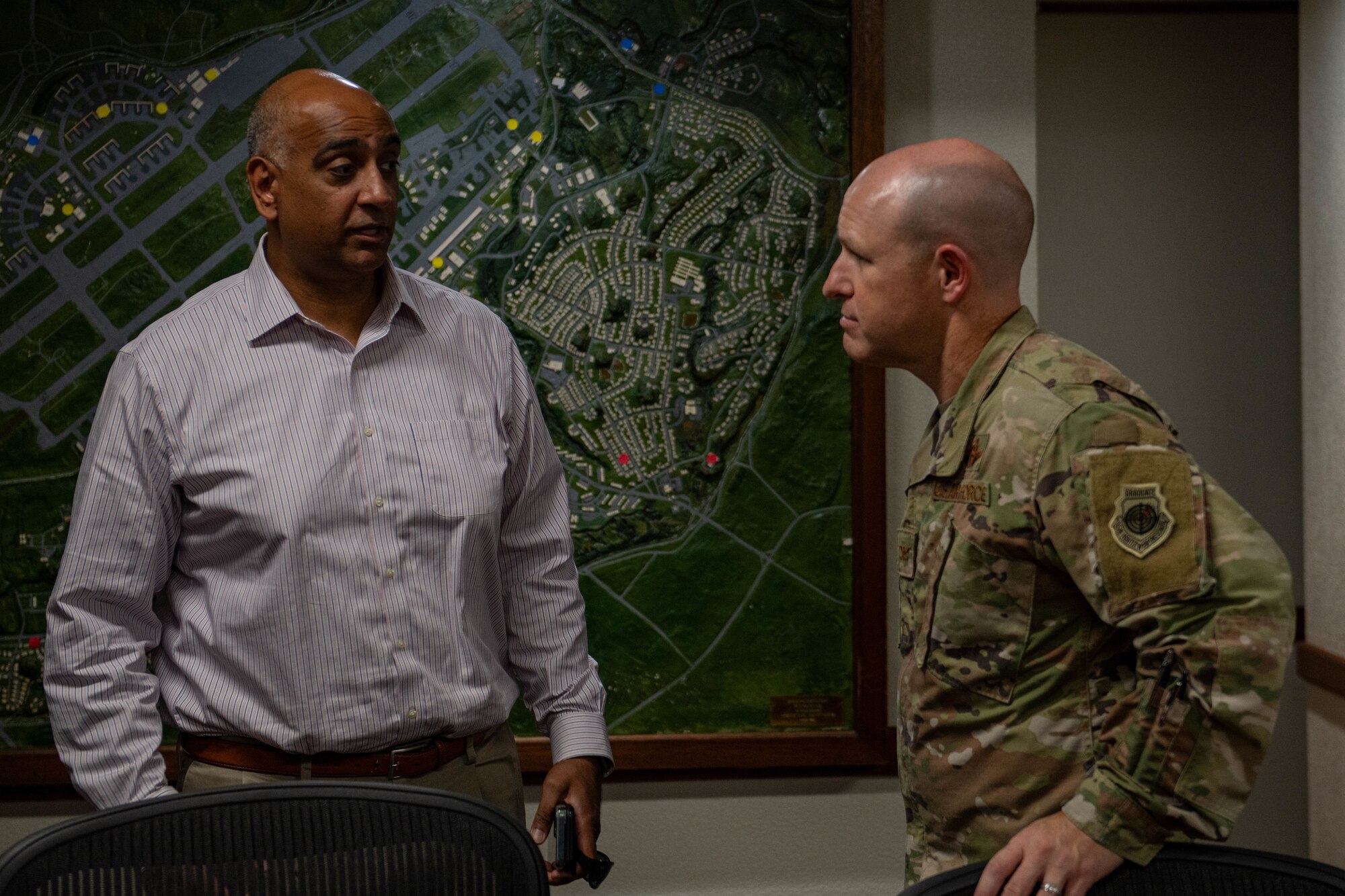 Dr. Chaudhary and Col. Evans prepare for a infrastructure brief