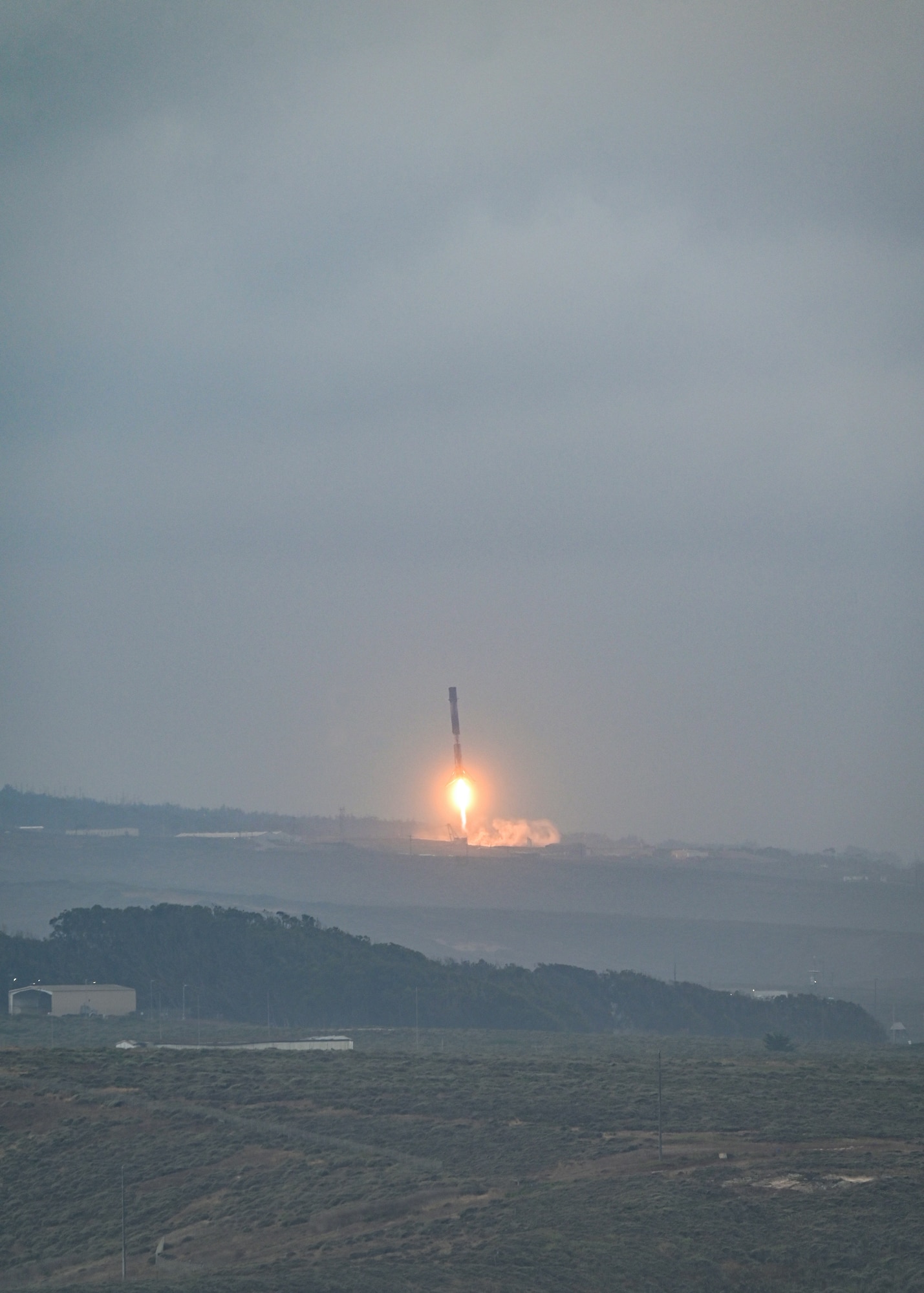 A rocket lands onto a launch pad