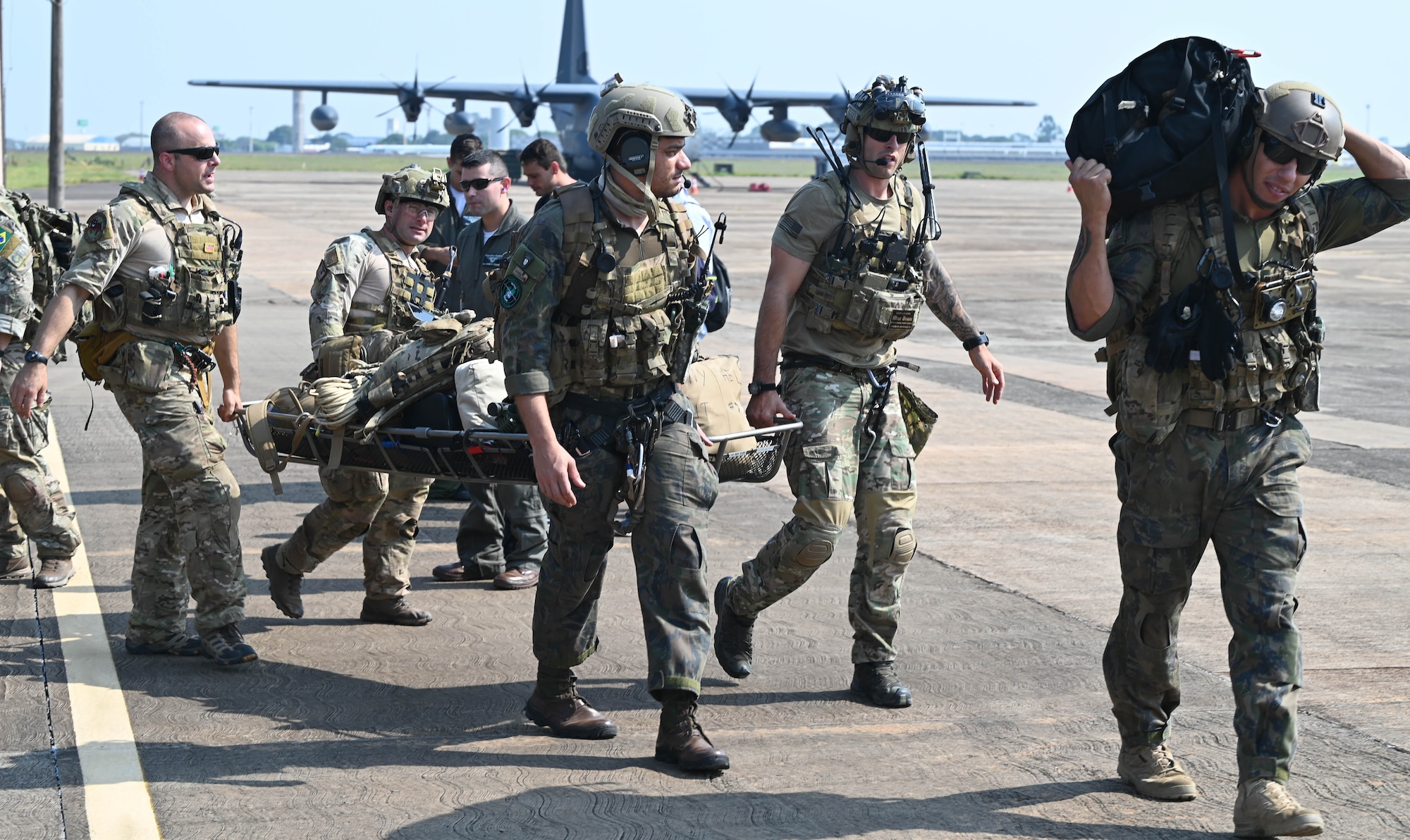 U.S. Air Force pararescuemen from the New York Air National Guard’s  106th Rescue Wing return from a search and rescue exercise alongside their Brazilian counterparts on Brazil’s Air Base Campo Grande in Campo Grande, Brazil, on August 25, 2023The New York Air National Guard deployed 100 Airmen to take part in Exercise Tapio, a combat search and rescue training exercise, as part of Brazil's State Partnership Program relationship with the New York National Guard. ( U.S. Air National Guard photo by Airman 1st Class Sarah McKernan)