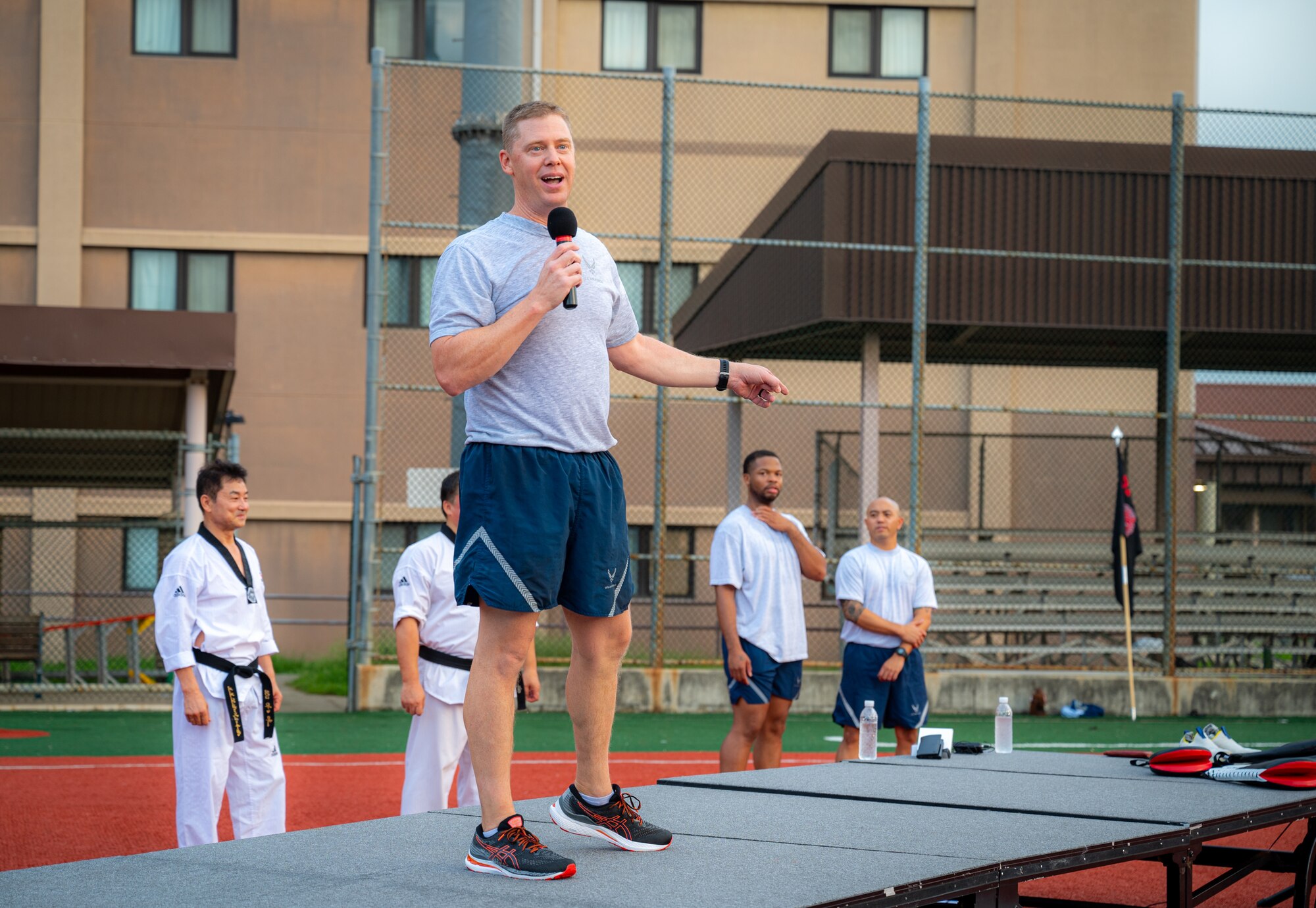 U.S. Air Force Col. Kyle Grygo, 51st Mission Support Group commander, offers words of empowerment to Airmen during a taekwondo training event at Osan Air Base, Republic of Korea, Aug. 25, 2023. Airmen remain agile and resilient when using innovative methods of physical fitness. (U.S. Air Force photo by Staff Sgt. Kelsea Caballero)