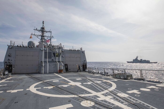 230904-N-NF288-005 SOUTH CHINA SEA (Sep. 04, 2023) The Arleigh Burke-class guided-missile destroyer USS Ralph Johnson (DDG 114) sails alongside the Republic of the Philippines Navy ship BRP Jose Rizal (FF 150) during a bilateral sail in the South China Sea, Sep. 4. Ralph Johnson is assigned to Commander, Task Force 71/Destroyer Squadron (DESRON) 15, the Navy’s largest forward-deployed DESRON and the U.S. 7th Fleet’s principal surface force. (U.S. Navy photo by Mass Communication Specialist 1st Class Jamaal Liddell)