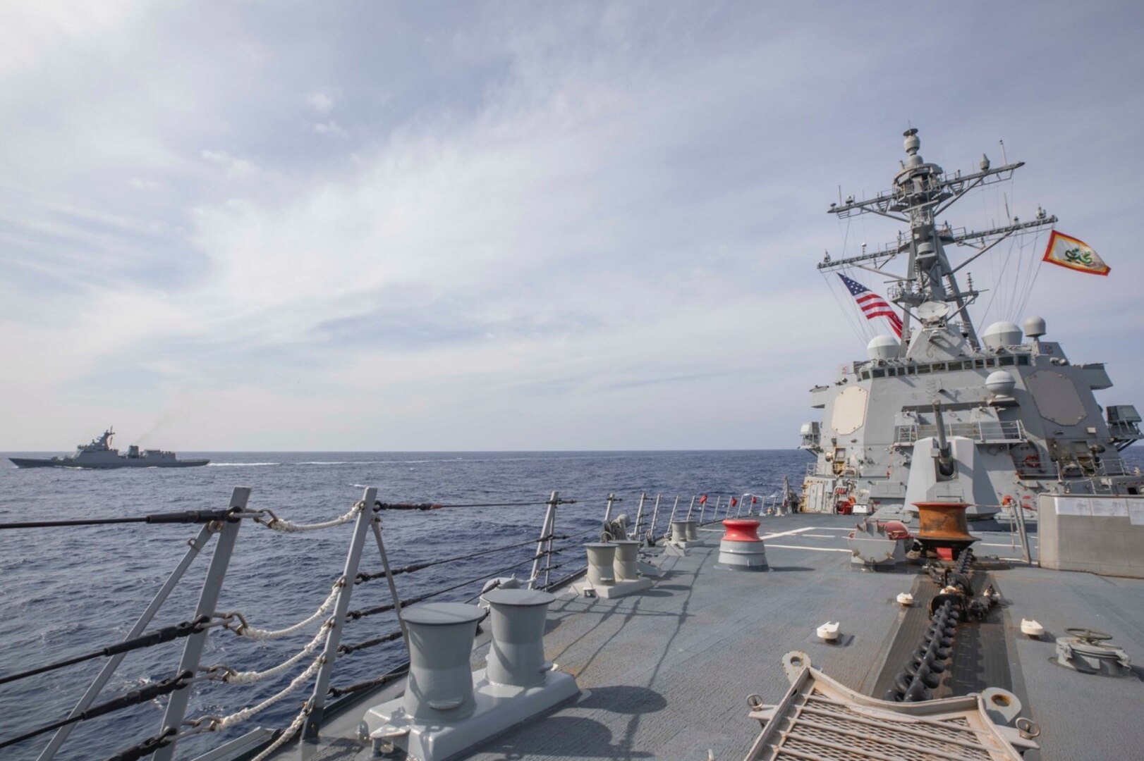 230904-N-NF288-016 SOUTH CHINA SEA (Sep. 04, 2023) The Arleigh Burke-class guided-missile destroyer USS Ralph Johnson (DDG 114) sails alongside the Republic of the Philippines Navy ship BRP Jose Rizal (FF 150) during a bilateral sail in the South China Sea, Sep. 4. Ralph Johnson is assigned to Commander, Task Force 71/Destroyer Squadron (DESRON) 15, the Navy’s largest forward-deployed DESRON and the U.S. 7th Fleet’s principal surface force. (U.S. Navy photo by Mass Communication Specialist 1st Class Jamaal Liddell)