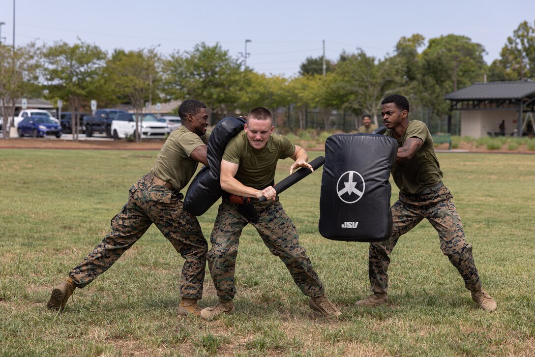 U.S. Marine Corps Lance Cpl. Vincent L. Cloutier, an administration clerk with 4th Marine Division, Marine Forces Reserve, participates during the oleoresin capsicum maneuver course during Security Augmentation Force training on Marine Forces Support Facility New Orleans, Louisiana, Aug 31, 2023. SAF training is done to provide the Marine Corps with qualified and properly trained Marines to support Military Provost Marshal’s Office. (U.S. Marine Corps photo by Sgt. Emely Gonzalez)