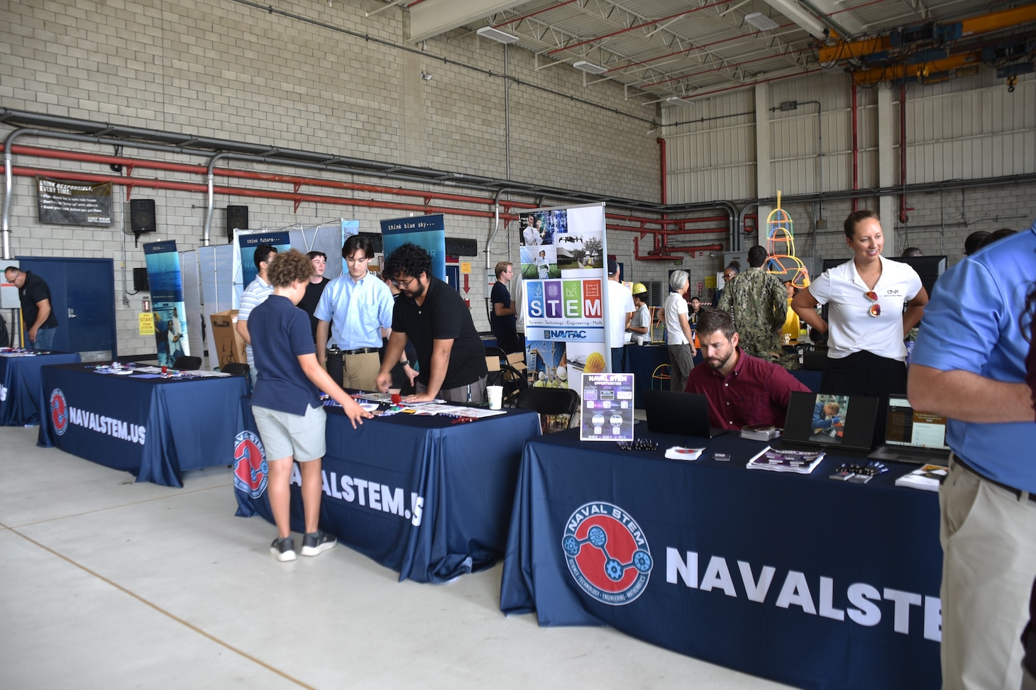 FRCSW STEM Outreach Program hosts a booth at the National Naval Officer's Association STEM day on the flight line at Naval Air Station North Island. Over 700 participants explored the world of science, technology, engineering, and mathematics.