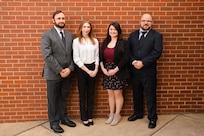 IMAGE: Joseph Eggert Jr., Alexandra Strauch, Olivia Smith and Kevin “Joe” Proffitt (left to right) of the Strategic and Computing Systems Department at Naval Surface Warfare Center Dahlgren Division were members of the Marine Air Defense Integrated System Desktop Trainer Team that earned the 2023 NAVSEA Warfare Centers Innovation Award.