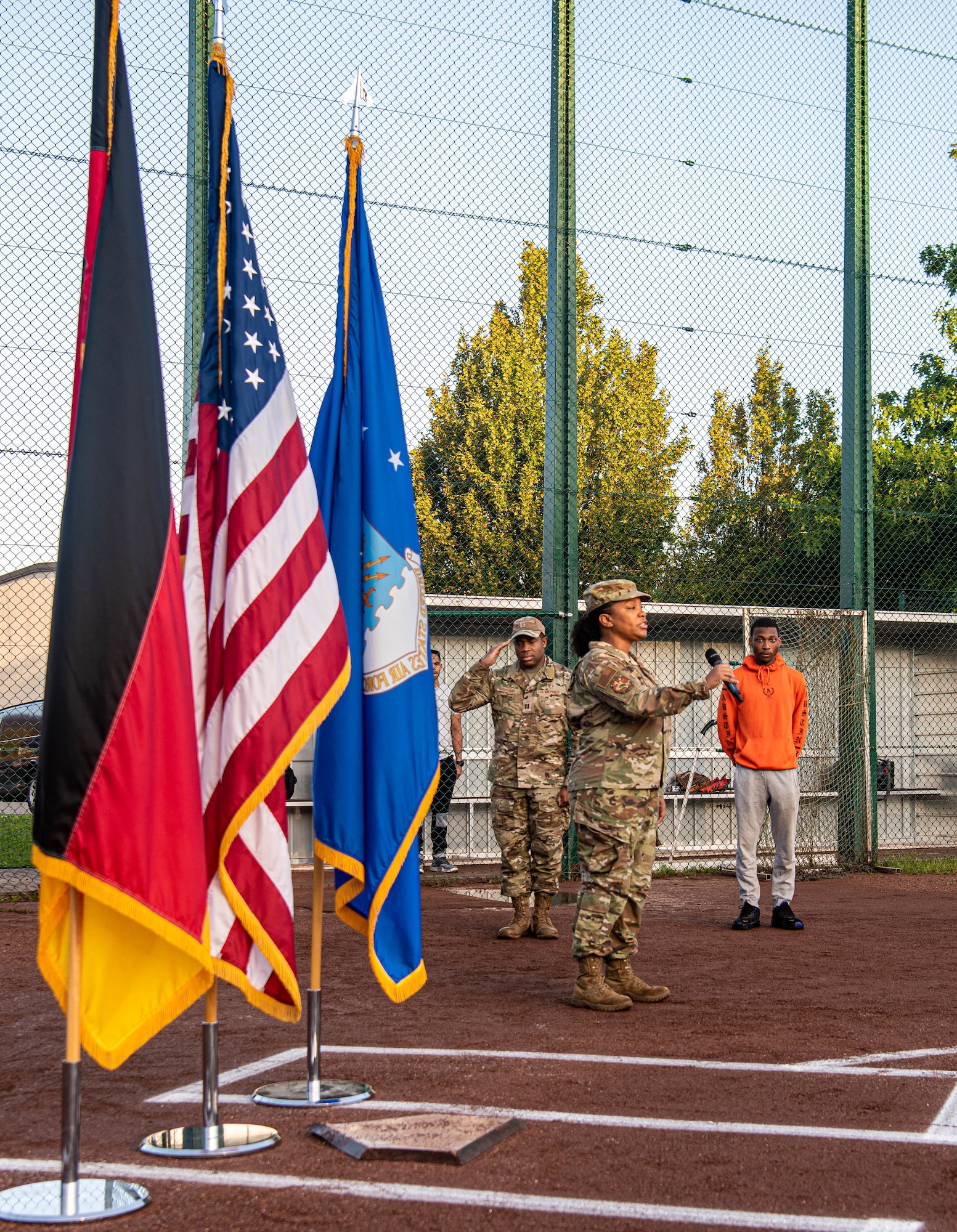 Participant sings national anthems.