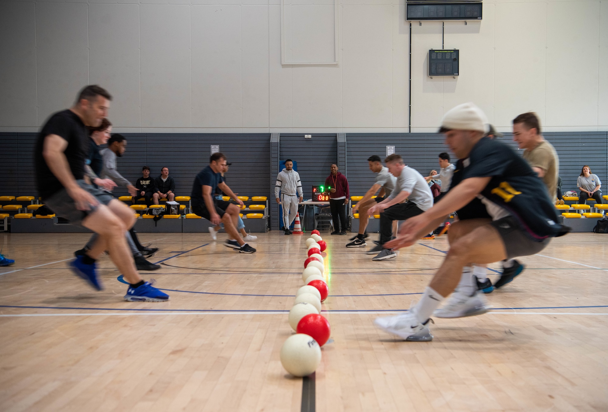 Participants play dodgeball.