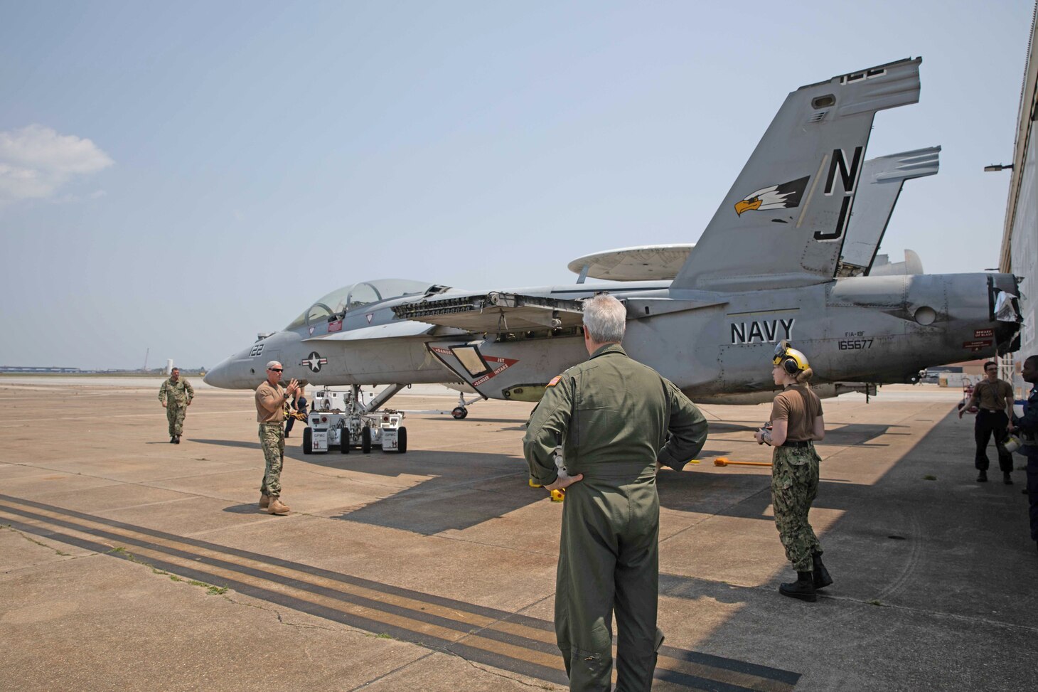 Rear Adm. John Meier, commander, Naval Air Force Atlantic (AIRLANT), observes Sailors assigned to the Nimitz-class aircraft carrier USS Harry S. Truman (CVN 75) during the Aviation Boatswain's Mate (Handling) University course of instruction on June 9. ABHU is a new course spearheaded by AIRLANT specifically designed for Sailors in the Aviation Boatswain's Mate (Handling) rate. During the course, Sailors refresh their skills and acquire more knowledge through classroom and hands-on training.