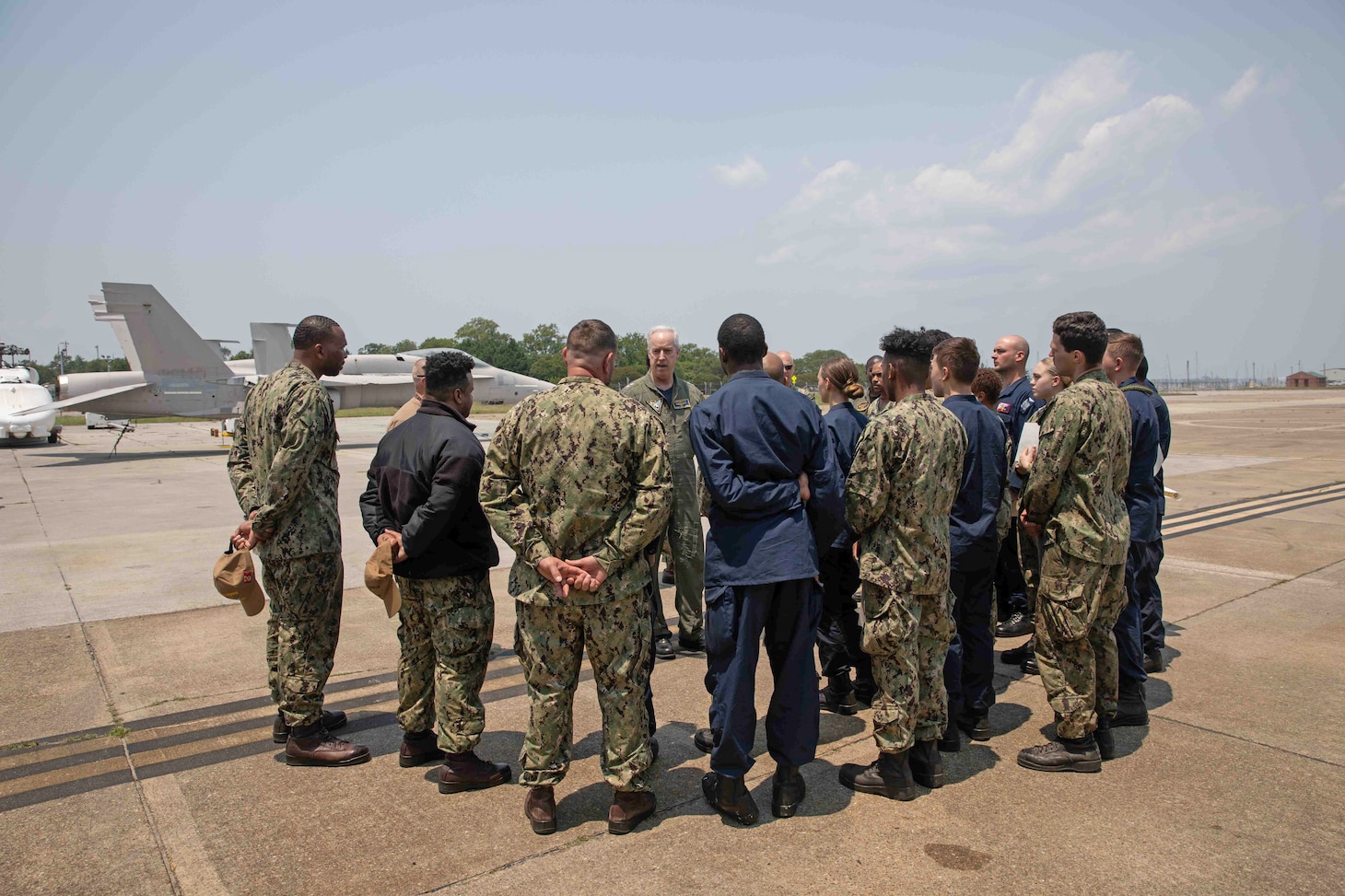 Rear Adm. John Meier, commander, Naval Air Force Atlantic (AIRLANT), congratulates Sailors assigned to the Nimitz-class aircraft carrier USS Harry S. Truman (CVN 75) following their completion of the second Aviation Boatswain's Mate (Handling) University course of instruction on June 9. ABHU is a new course spearheaded by AIRLANT specifically designed for Sailors in the Aviation Boatswain's Mate (Handling) rate. During the course, Sailors refresh their skills and acquire more knowledge through classroom and hands-on training.
