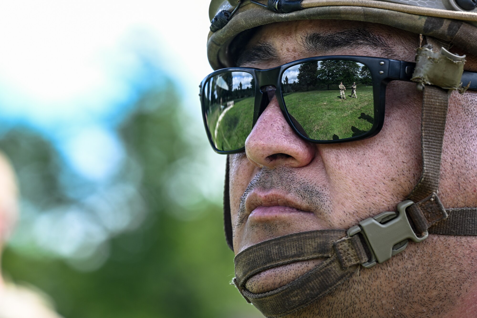 Senior Airman Jose Leos, a Defender assigned to the Texas Air National Guard’s 204th Security Forces Squadron, listens to an Integrated Defense Leadership Course grenade safety briefing on Aug. 15, 2023, at Camp James A. Garfield Joint Military Training Center, Ohio.