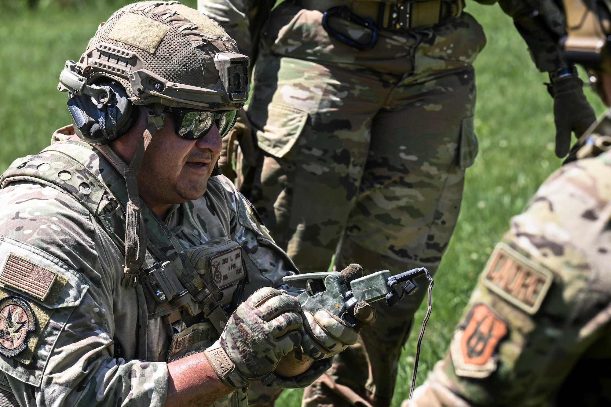 Senior Airman Jose Leos, a Defender assigned to the Texas Air National Guard’s 204th Security Forces Squadron, performs a safety check prior to detonating a claymore during an Integrated Defense Leadership Course exercise on Aug. 15, 2023, at Camp James A. Garfield Joint Military Training Center, Ohio.