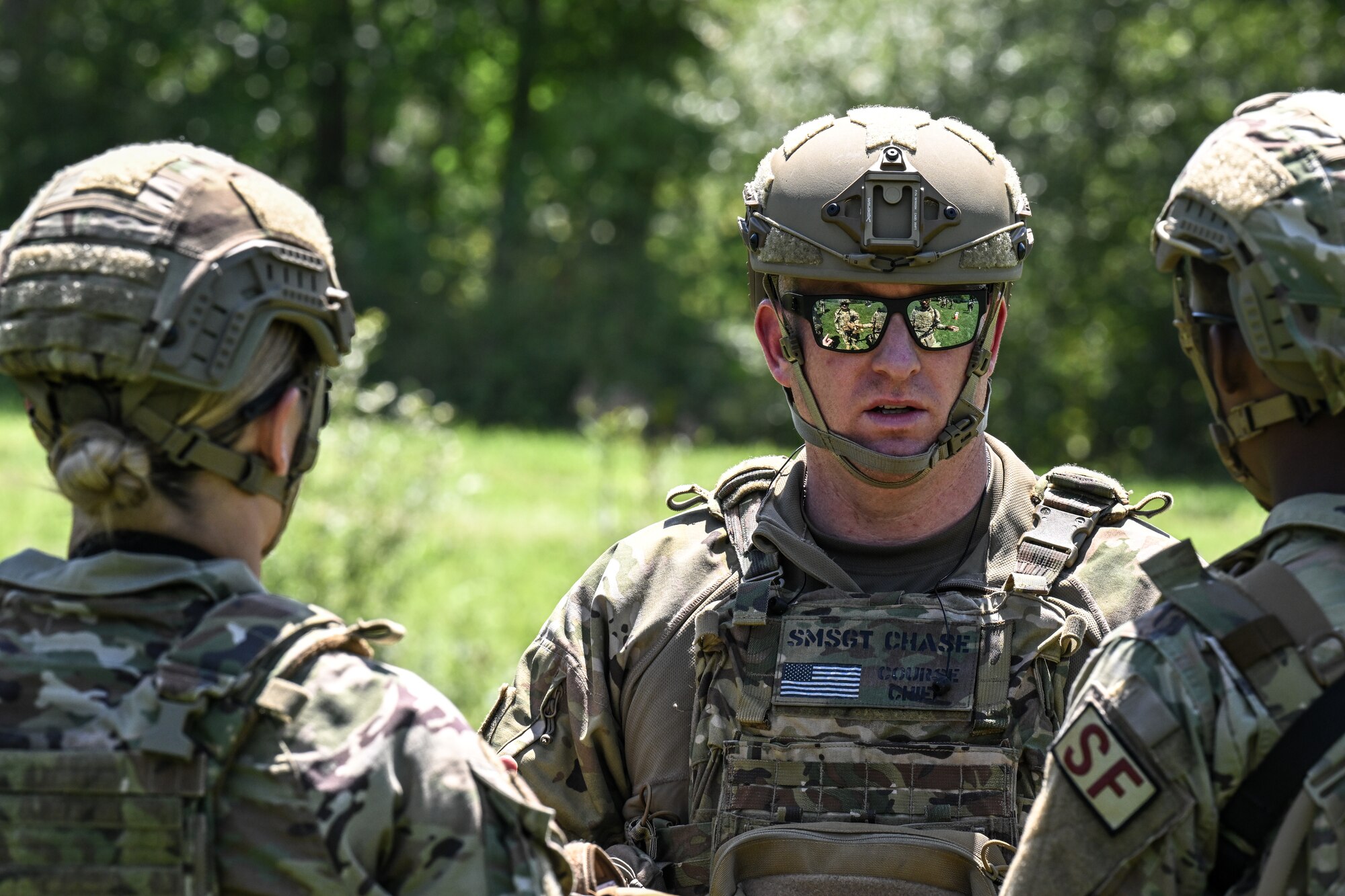 Senior Master Sgt. Daniel Chase, Integrated Defense Leadership Course chief assigned to the 310th Security Forces Squadron, Schriever Space Force Base, Colorado, teaches IDLC students how to detonate a claymore on Aug. 15, 2023, at Camp James A. Garfield Joint Military Training Center, Ohio.