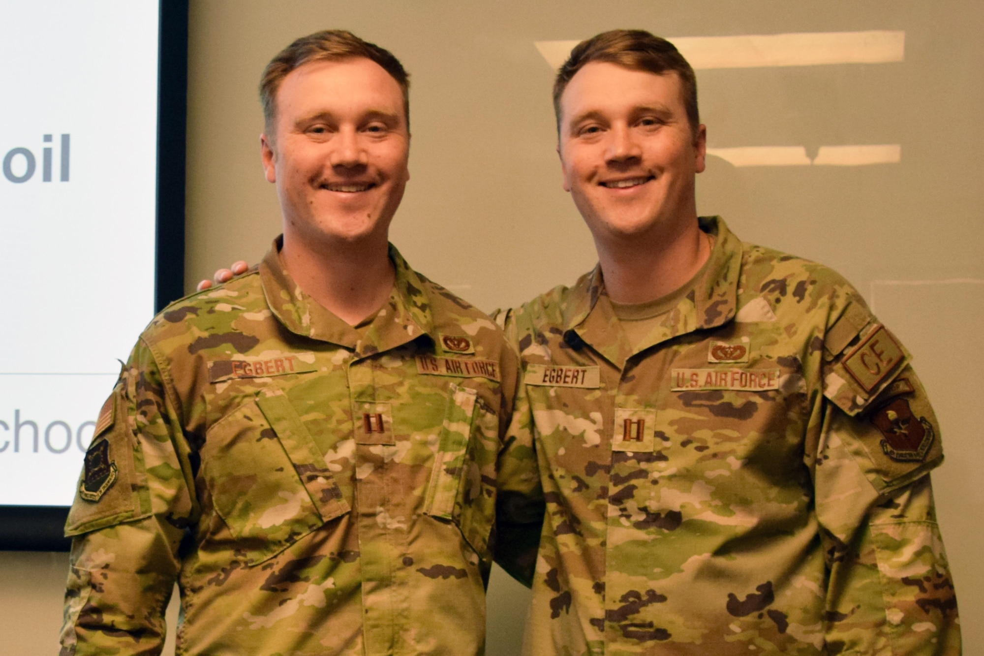 Identical twins, Capts. Connor and Kyle Egbert, serve as pavement instructors at the Air Force Institute of Technology’s Civil Engineer School. (US Air Force photo by Katie Scott)