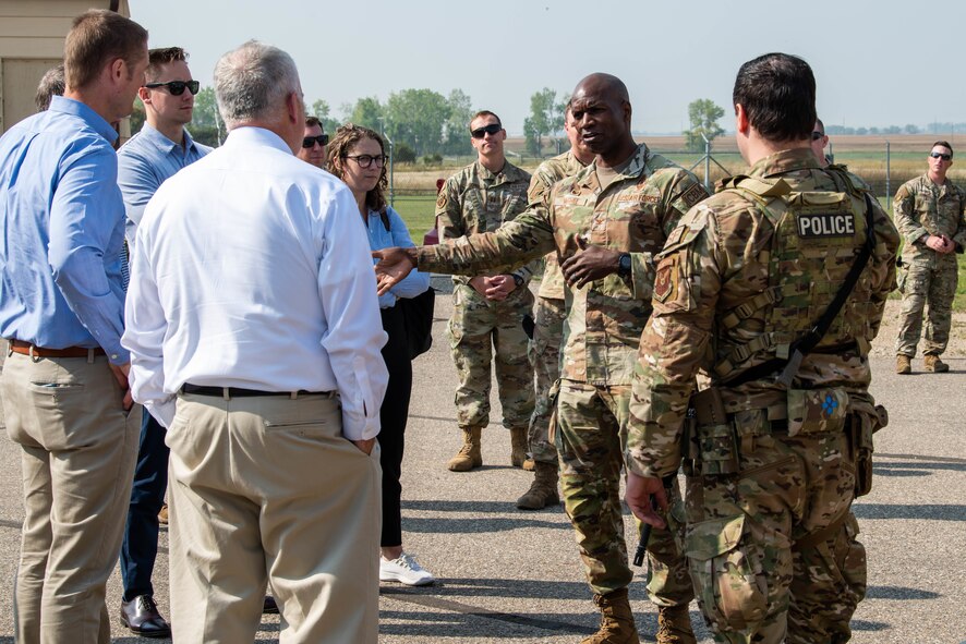 Col. Kenneth McGhee, 91st Missile Wing commander, briefs Mr. John Keast, United States Senate Armed Services Committee staff director for U.S. Senator Roger Wicker, and other members of the tour during a demonstration at Missile Alert Facility  Oscar-1 at Minot, North Dakota, Aug. 30, 2023. Defenders are responsible for the secure entry and exit of all personnel at MAF sites. (U.S. Air Force Photo by Airman 1st Class Alexander Nottingham)