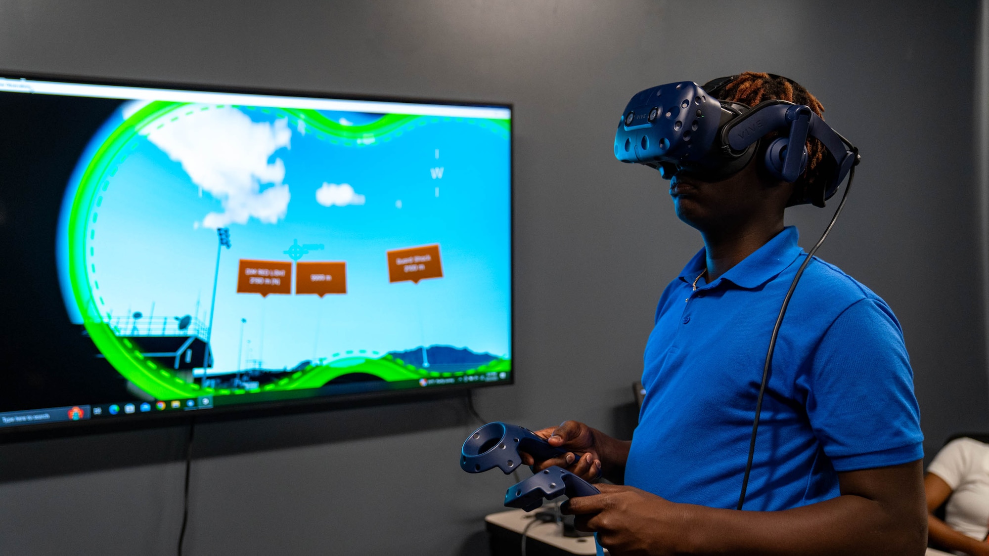 A Meridian High School JROTC student uses virtual reality to experience weather phenomena at the 335th Training Squadron at Keesler Air Force Base, Mississippi, Aug. 22, 2023.