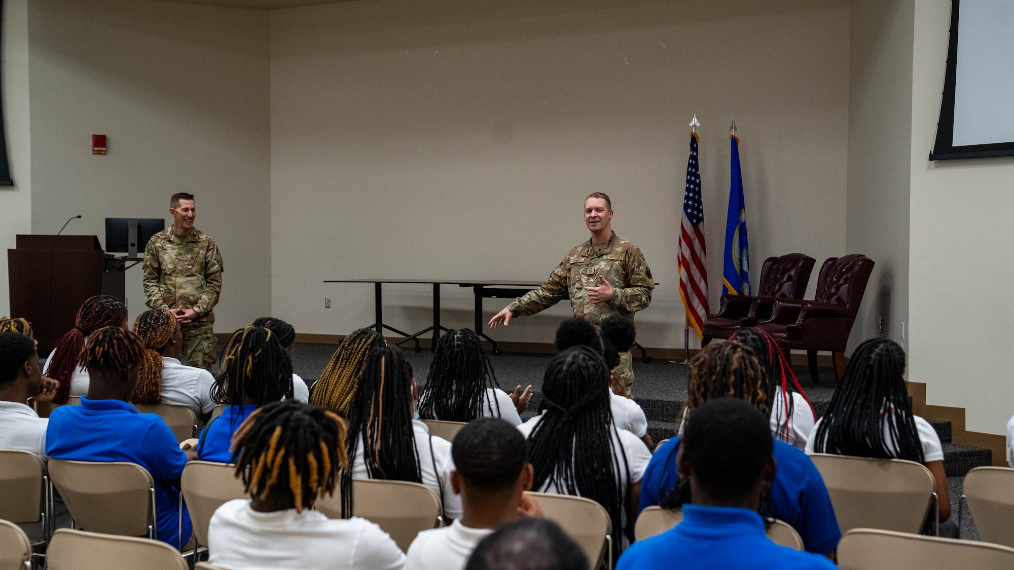 U.S. Air Force Col. Billy Pope, Jr., 81st Training Wing commander, and Chief Master Sgt. Michael Venning, 81st TRW command chief, give a mission brief to Meridian High School JROTC students at Keesler Air Force Base, Mississippi, Aug. 22, 2023.