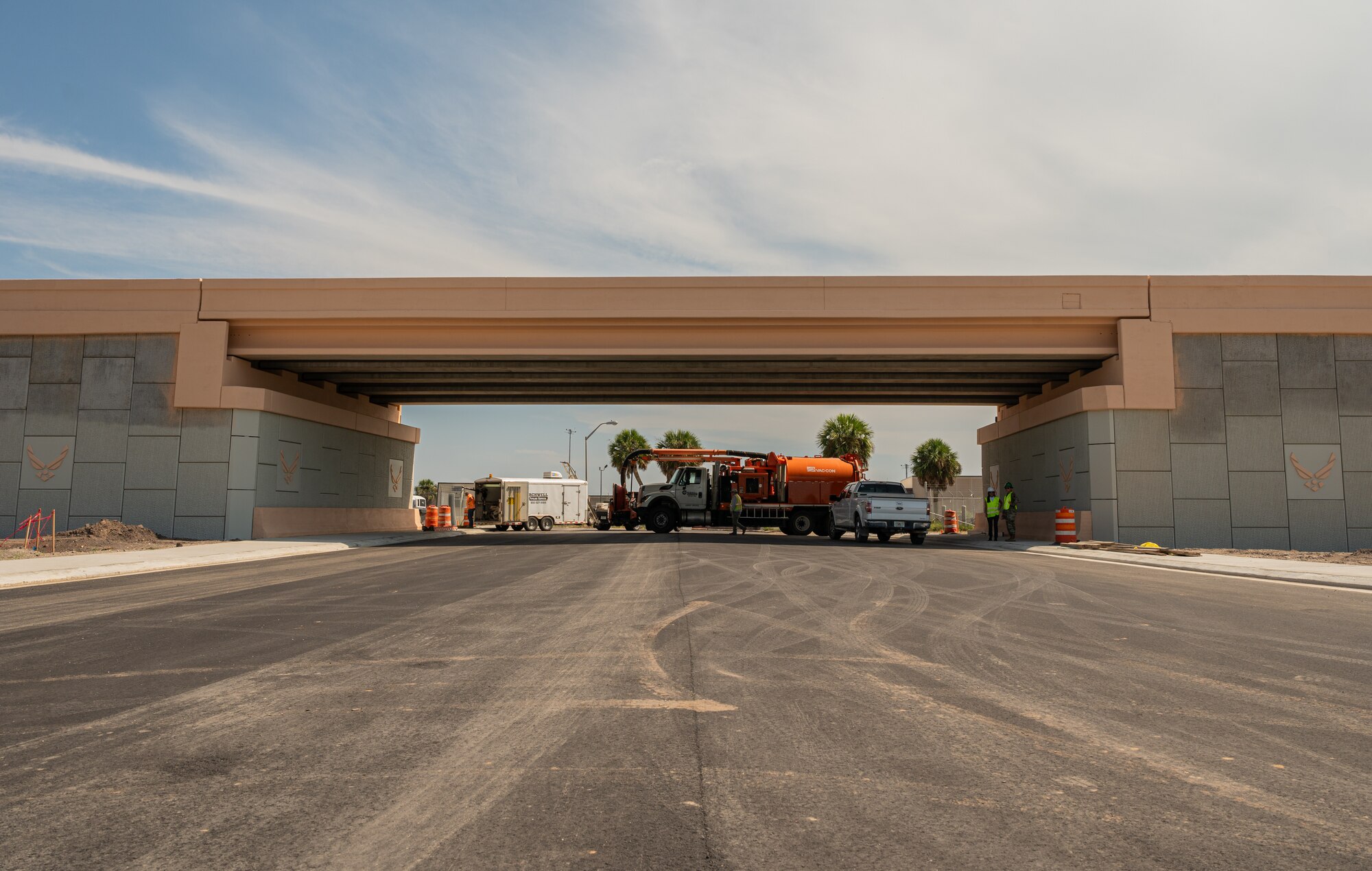 A completed flyover sits at a construction site