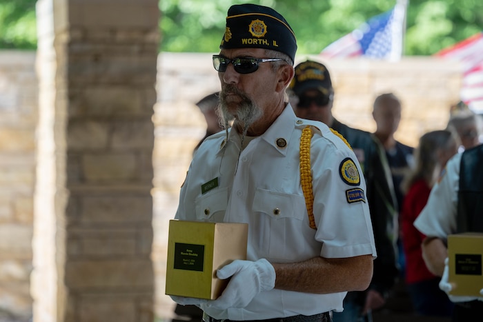Man holds urn