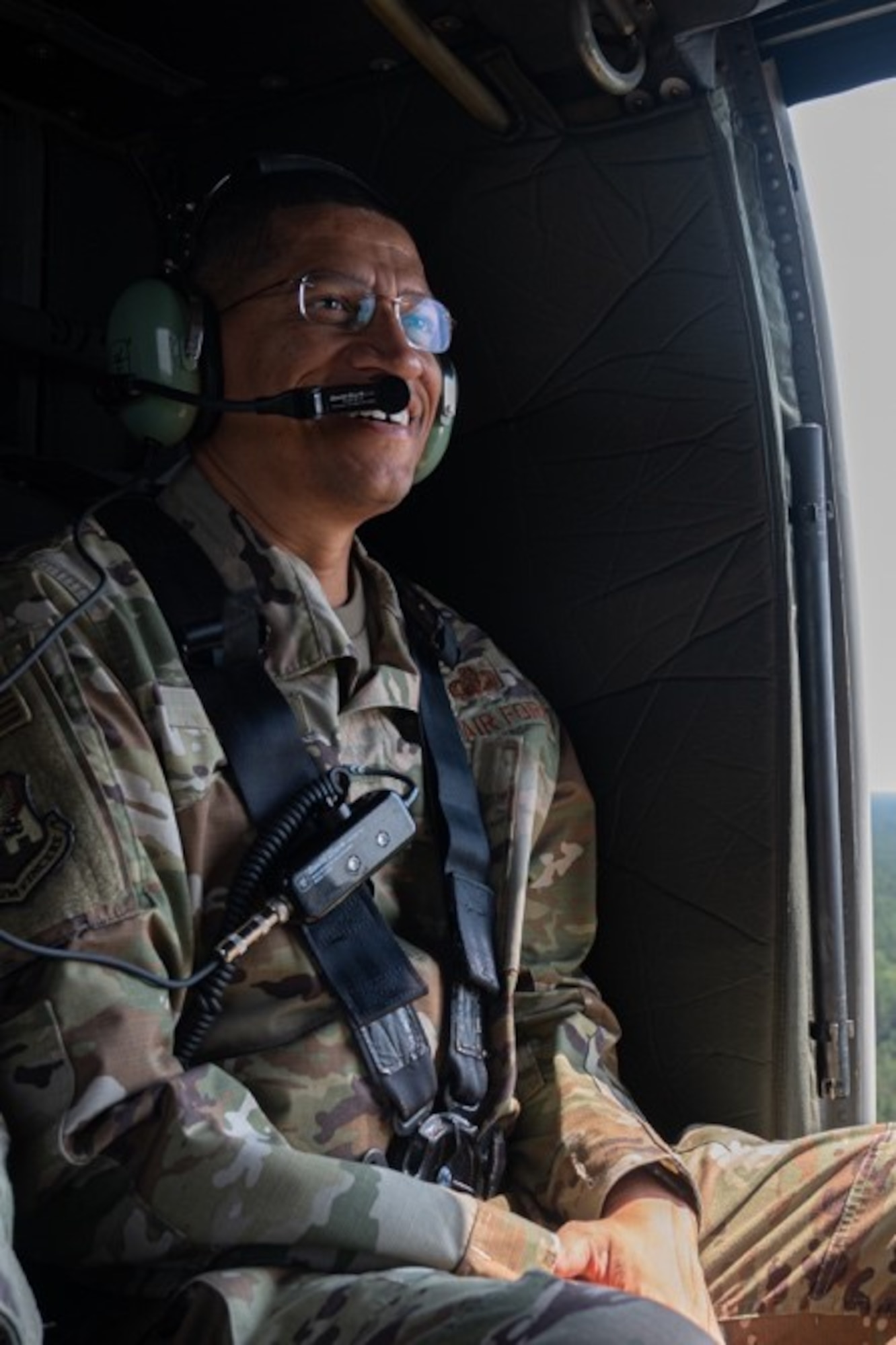 U.S. Air Force Col. Anthony L. Smith, Joint Base McGuire-Dix-Lakehurst commander and the 87th Air Base Wing commander tours JB MDL, N.J. aboard a UH-60M Blackhawk during an immersion brief, July 11, 2023. Army Support Activity Fort Dix leadership hosted the tour to showcase the various missions on Fort Dix and Naval Support Activity Lakehurst. (U.S. Air Force photo by Airman 1st Class Simonne Barker)