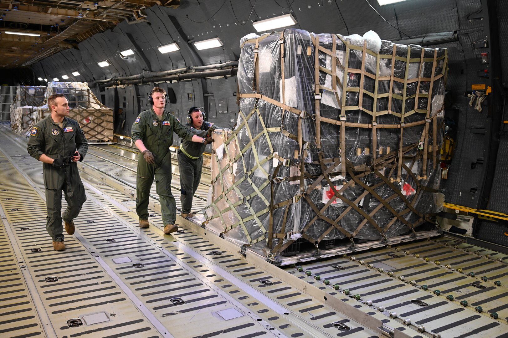 Loadmasters from the 433rd Operations Group unload equipment used in Patriot Medic 23 after the 433rd Medical Squadron returned to JBSA-Lackland on Aug. 29, 2023.