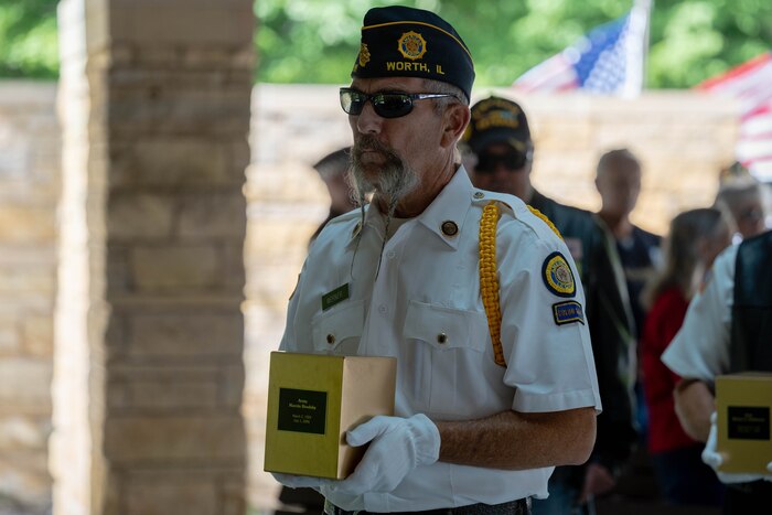 Man holds urn
